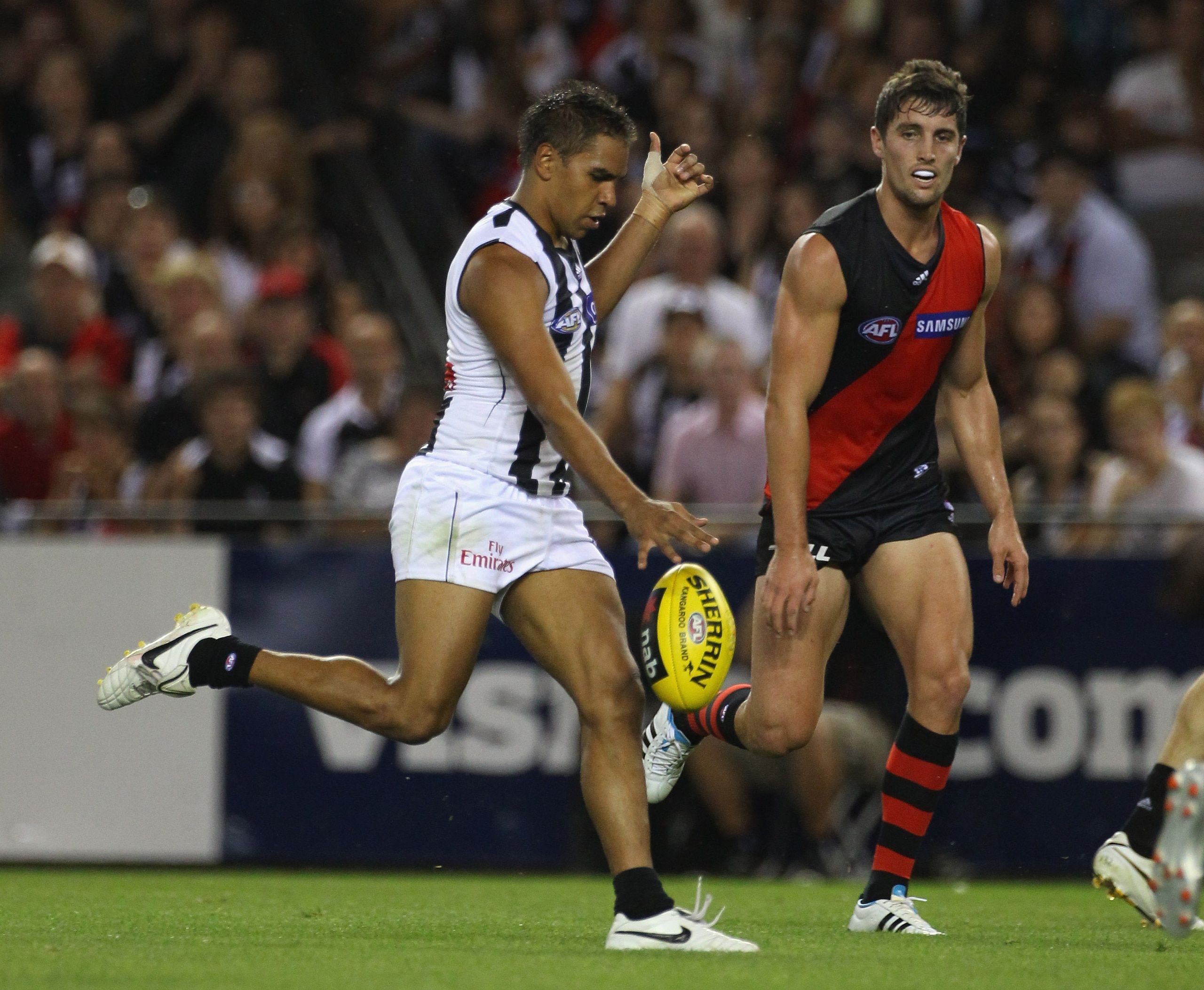 MELBOURNE, AUSTRALIA - MARCH 11: Andrew Krakouer of the Magpies kicks for goal during the NAB Cup AFL Grand Final match between the Essendong Bombers and the Collingwood Magpies at Etihad Stadium on March 11, 2011 in Melbourne, Australia.  (Photo by Rober