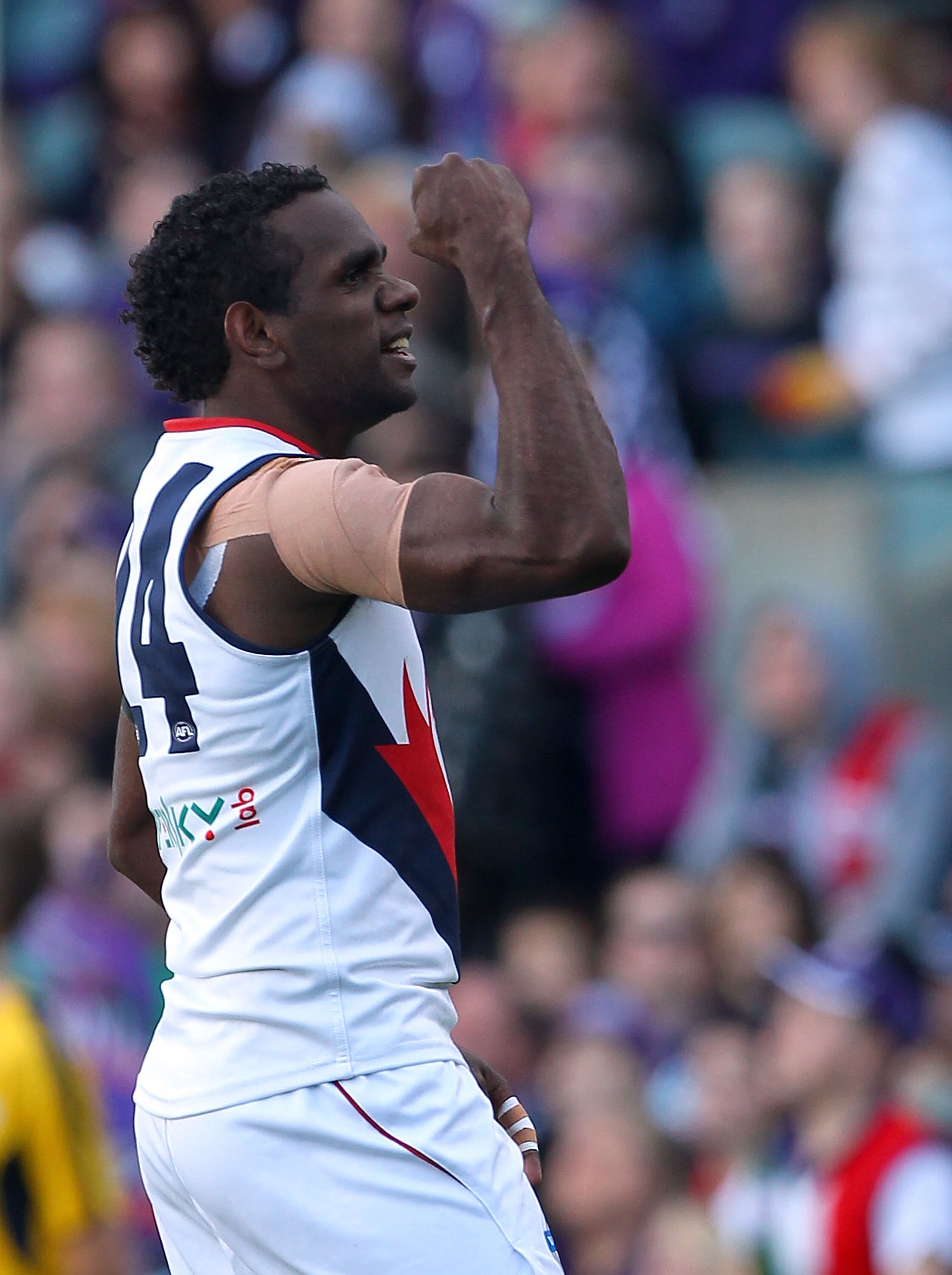 PERTH, AUSTRALIA - JULY 18: Liam Jurrah of the Demons celebrates a goal during the round 16 AFL match between the Fremantle Dockers and the Melbourne Demons at Subiaco Oval on July 18, 2010 in Perth, Australia.  (Photo by Paul Kane/Getty Images)