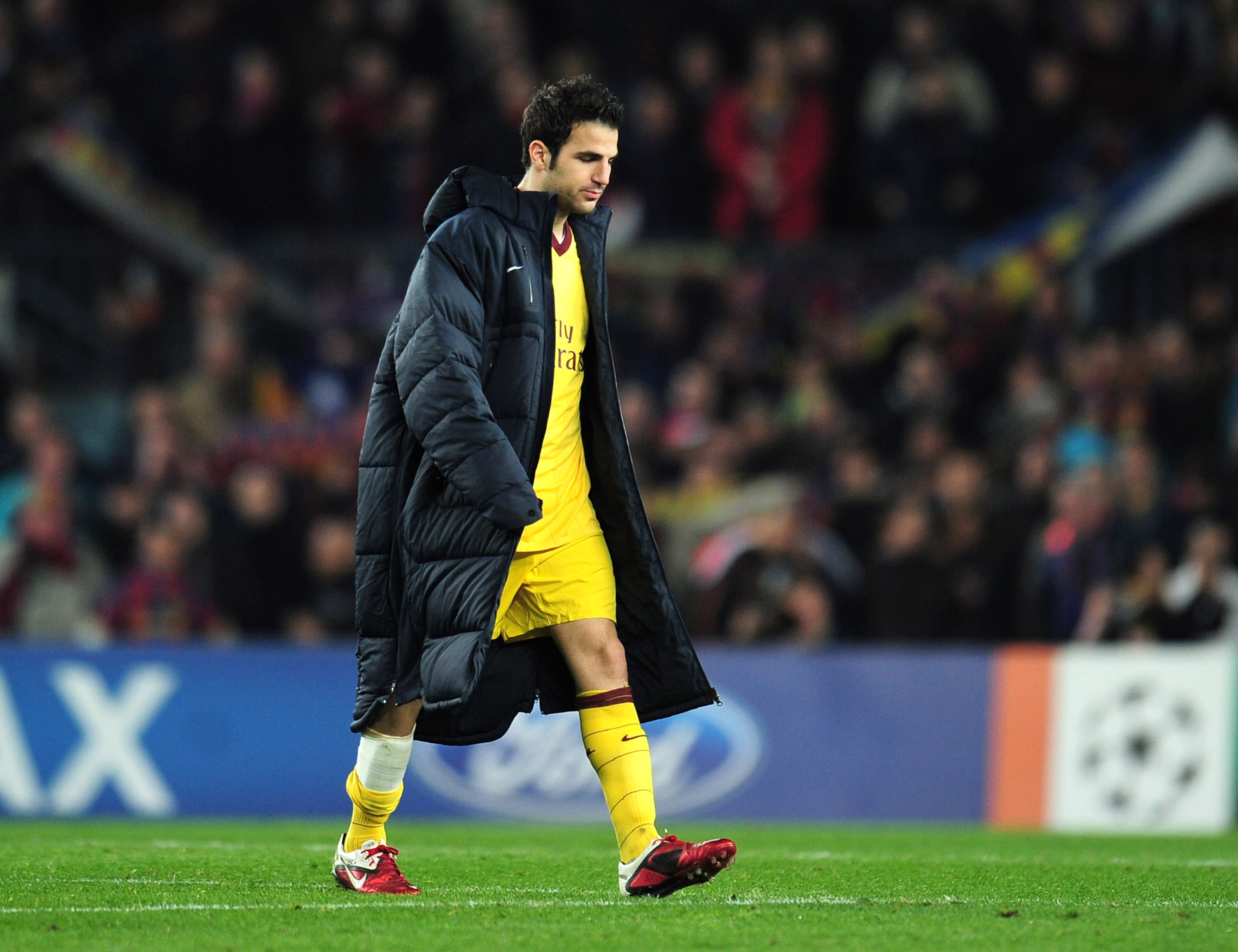 BARCELONA, SPAIN - MARCH 08:  Cesc Fabregas of Arsenal leaves the field at the end of the UEFA Champions League round of 16 second leg match between Barcelona and Arsenal at the Nou Camp Stadium on March 8, 2011 in Barcelona, Spain.  (Photo by Shaun Botte