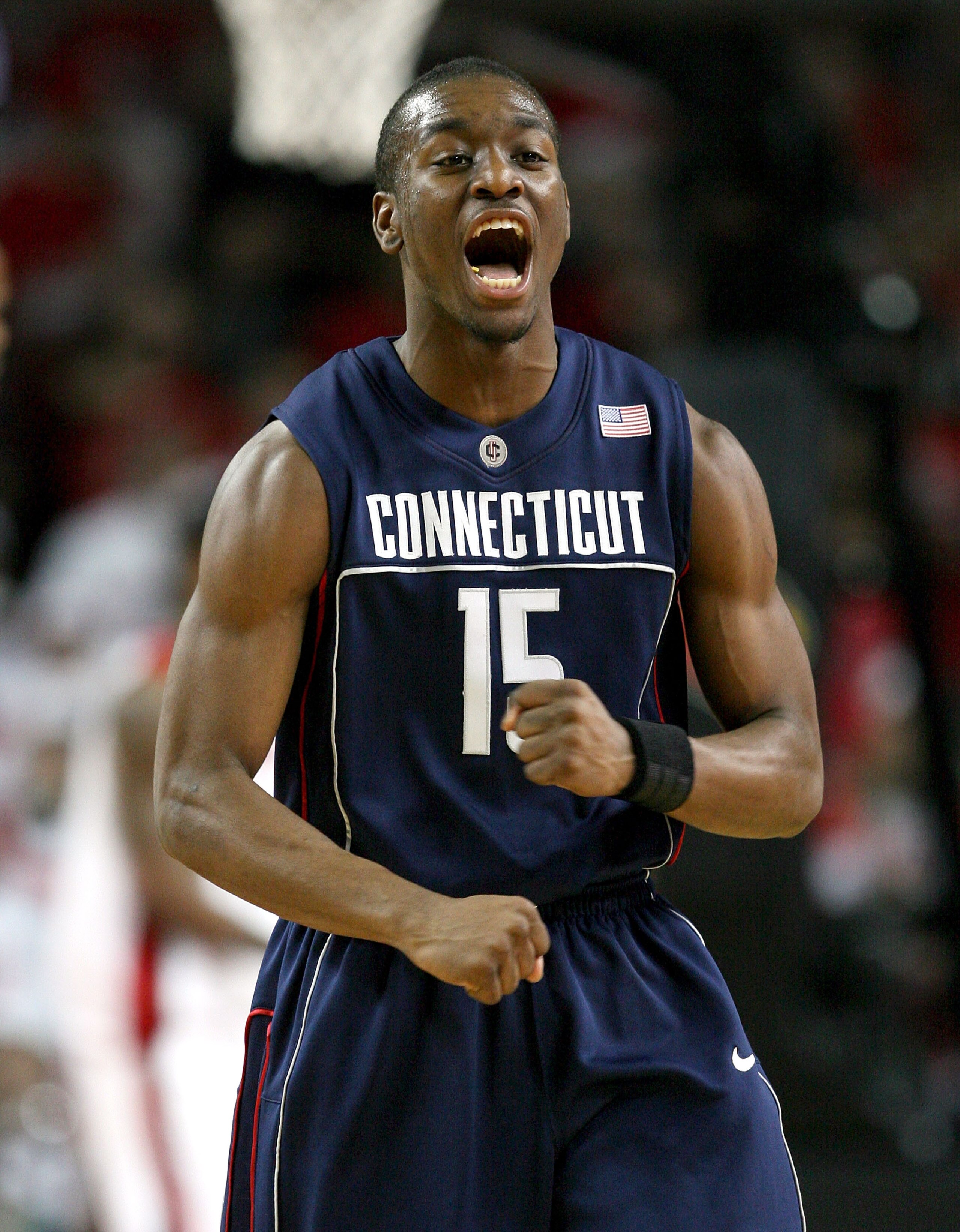 LOUISVILLE, KY - FEBRUARY 02:  Kemba Walker #15 of the Connecticut Huskies celebrates during the Big East Conference game against the Louisville Cardinals on February 2, 2009 at Freedom Hall in Louisville, Kentucky.  (Photo by Andy Lyons/Getty Images)