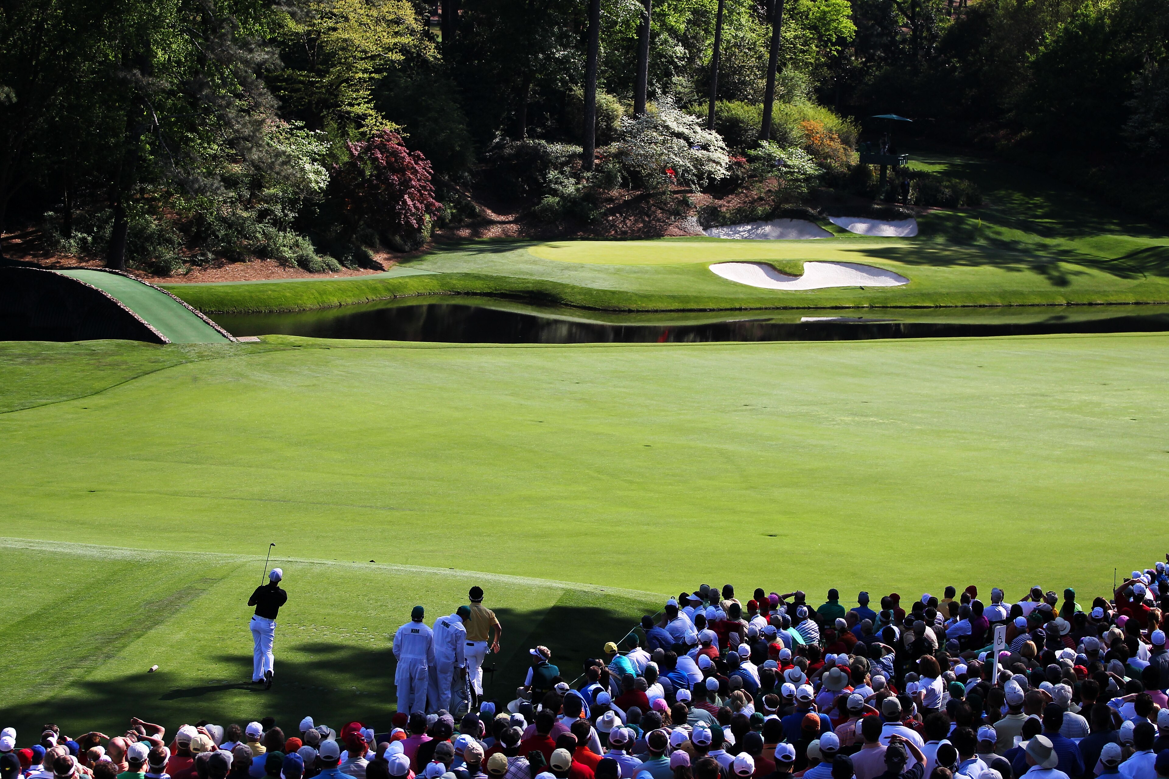 AUGUSTA, GA - APRIL 11:  Anthony Kim watches his tee shot on the 12th hole during the final round of the 2010 Masters Tournament at Augusta National Golf Club on April 11, 2010 in Augusta, Georgia.  (Photo by Jamie Squire/Getty Images)