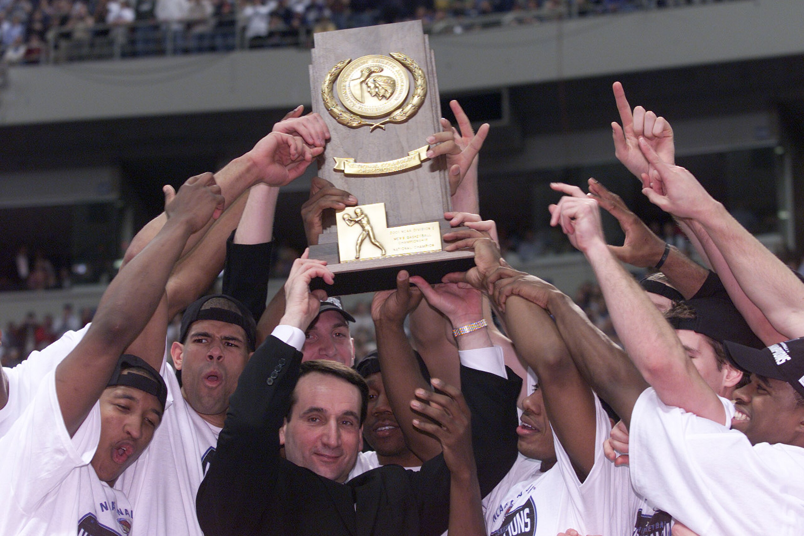 2 Apr 2001:  Head coach Mike Krzyzewski and the Duke players all celebrate after defeating Arizona 82-72 in the NCAA National Championship Game of the Men's Final Four tournament at the Metrodome in Minneapolis, Minnesota.  DIGITAL IMAGE. Mandatory Credit