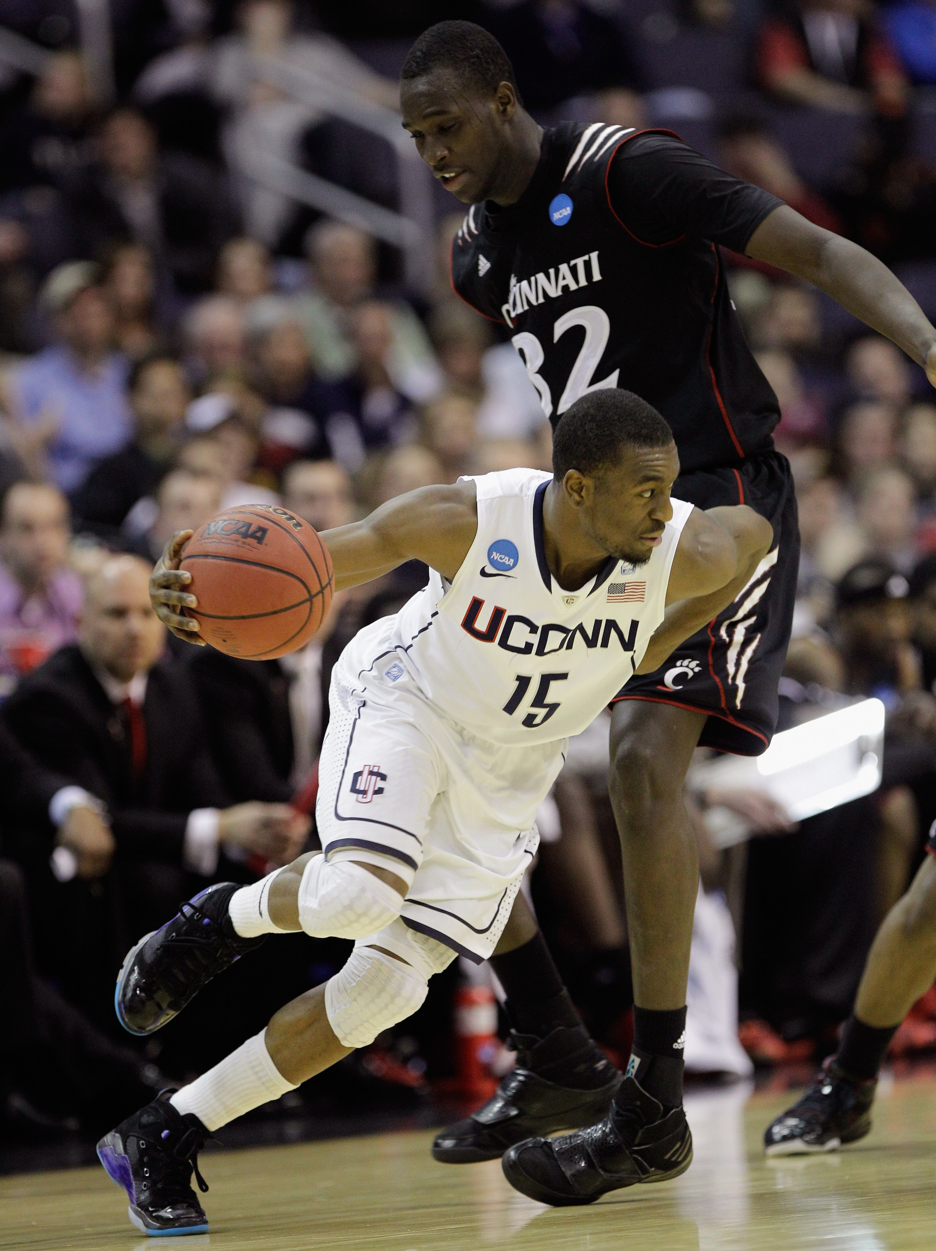 WASHINGTON - MARCH 19: Kemba Walker #15 of Connecticut drives around Ibrahima Thomas #32 of Cincinnati during the third round of the 2011 NCAA men's basketball tournament at Verizon Center on March 19, 2011 in Washington, DC. (Photo by Rob Carr/Getty Im WASHINGTON - MARCH 19: Kemba Walker #15 of Connecticut drives around Ibrahima Thomas #32 of Cincinnati during the third round of the 2011 NCAA men's basketball tournament at Verizon Center on March 19, 2011 in Washington, DC. (Photo by Rob Carr/Getty Im
