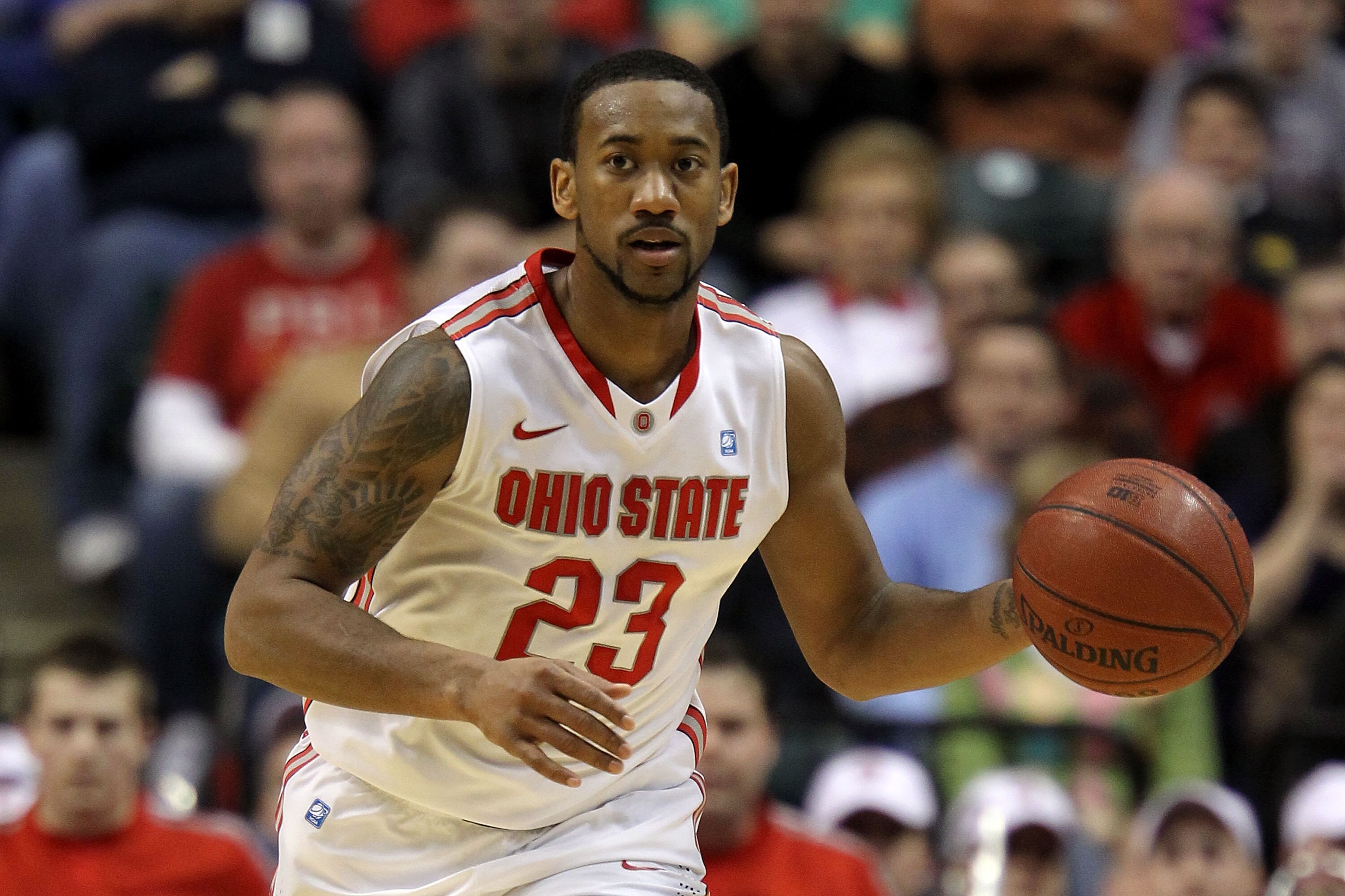 INDIANAPOLIS, IN - MARCH 12:  David Lighty #23 of the Ohio State Buckeyes brings the ball up court against the Michigan Wolverines during the semifinals of the 2011 Big Ten Men's Basketball Tournament at Conseco Fieldhouse on March 12, 2011 in Indianapoli
