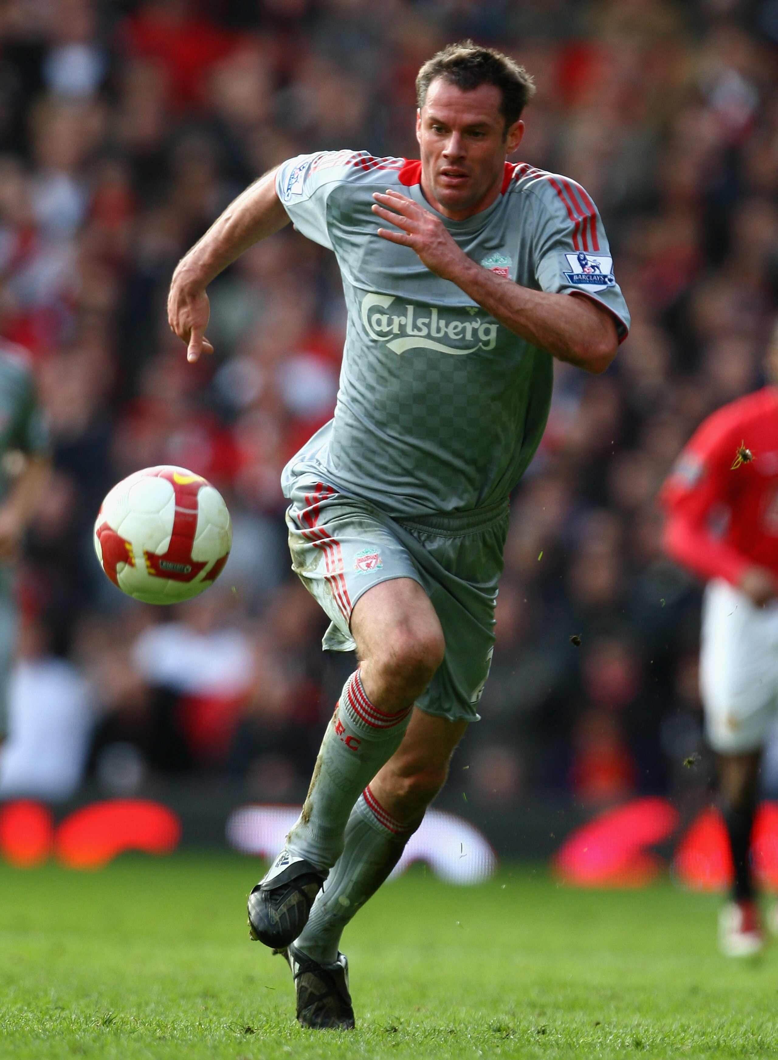 MANCHESTER, UNITED KINGDOM - MARCH 14:  Jamie Carragher of Liverpool in action during the Barclays Premier League match between Manchester United and Liverpool at Old Trafford on March 14, 2009 in Manchester, England. (Photo by Laurence Griffiths/Getty Im