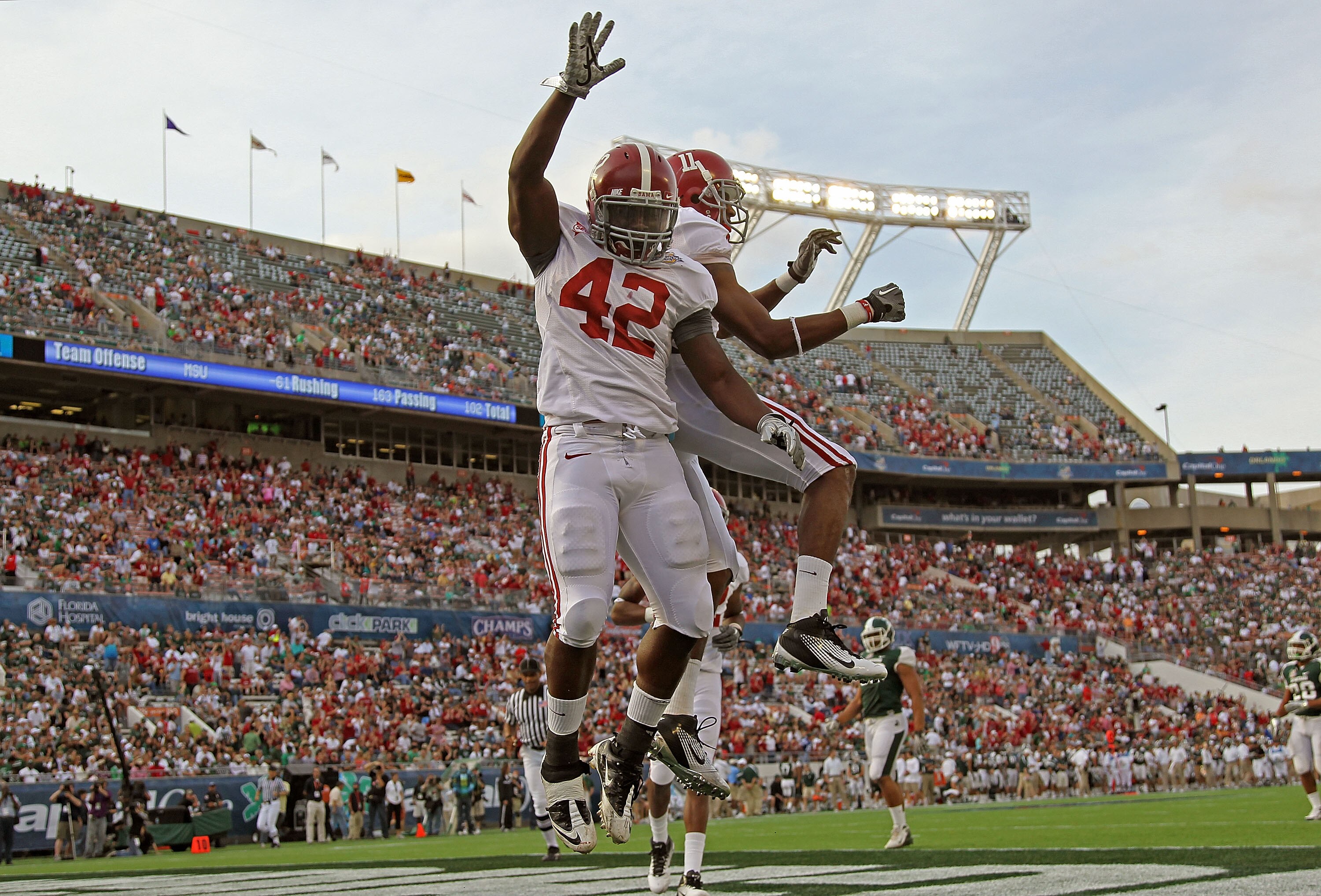 ORLANDO, FL - JANUARY 01: Eddie Lacy #42 of the Alabama Crimson Tide celebrates after rushing for a touchdown during the Capitol One Bowl against the Michigan State Spartans at the Florida Citrus Bowl on January 1, 2011 in Orlando, Florida. (Photo by Mi ORLANDO, FL - JANUARY 01: Eddie Lacy #42 of the Alabama Crimson Tide celebrates after rushing for a touchdown during the Capitol One Bowl against the Michigan State Spartans at the Florida Citrus Bowl on January 1, 2011 in Orlando, Florida. (Photo by Mi