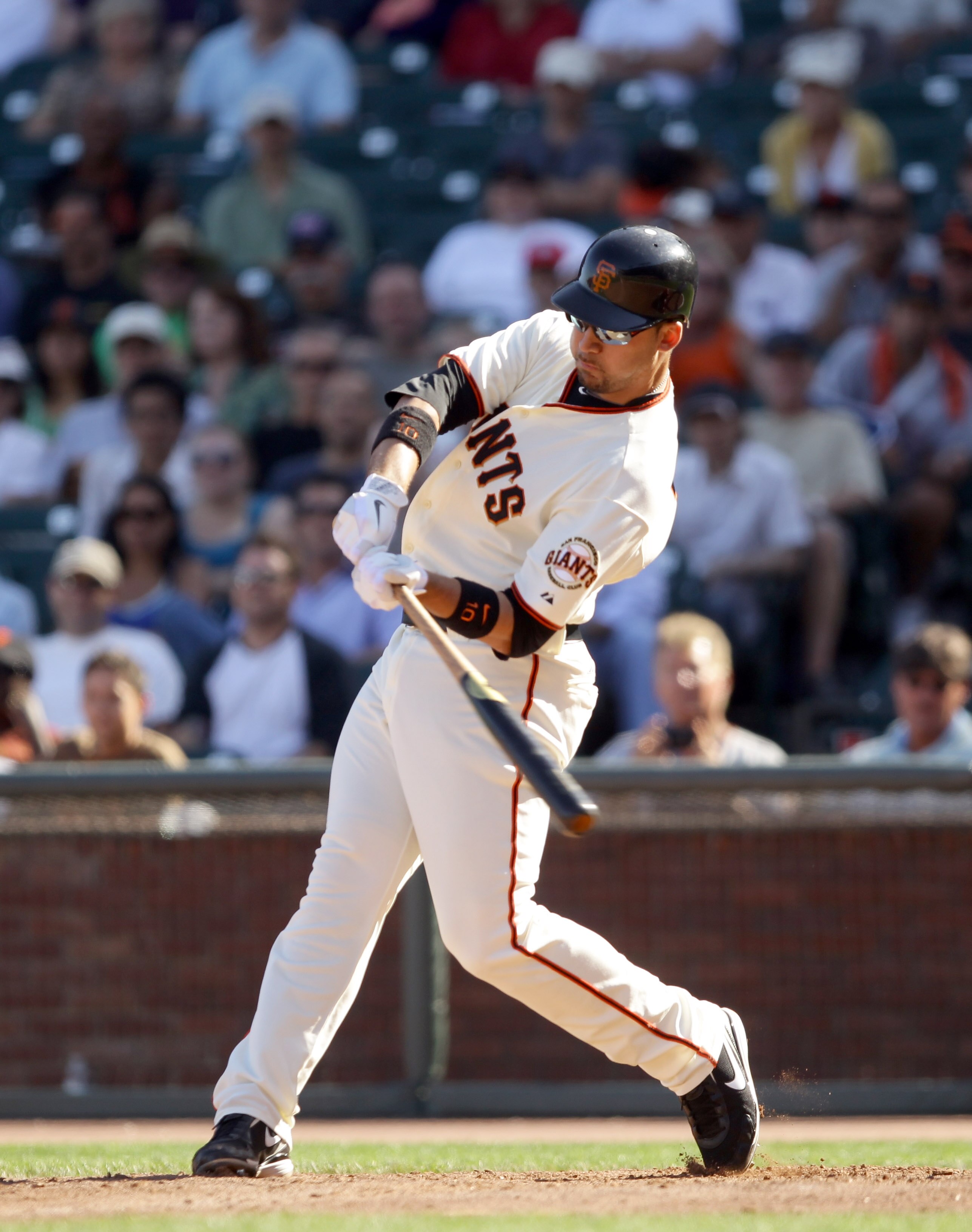 SAN FRANCISCO - AUGUST 25:  Travis Ishikawa #10 of the San Francisco Giants bats against the Cincinnati Reds at AT&T Park on August 25, 2010 in San Francisco, California.  (Photo by Ezra Shaw/Getty Images)