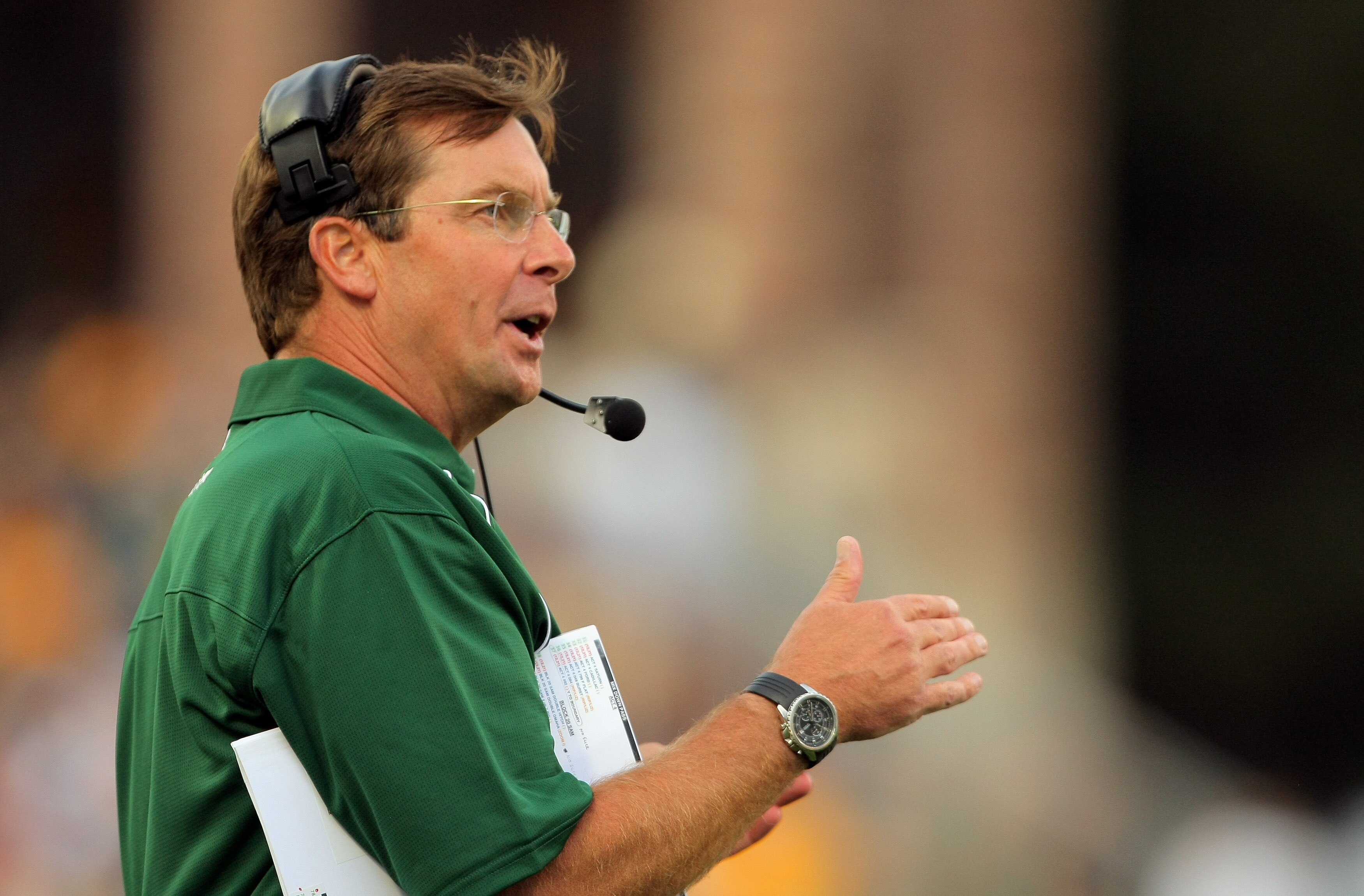BOULDER, CO - SEPTEMBER 06:  Head coach Steve Fairchild of the Colorado State Rams leads his team against the Colorado Buffaloes at Folsom Field on September 6, 2009 in Boulder, Colorado.  (Photo by Doug Pensinger/Getty Images)