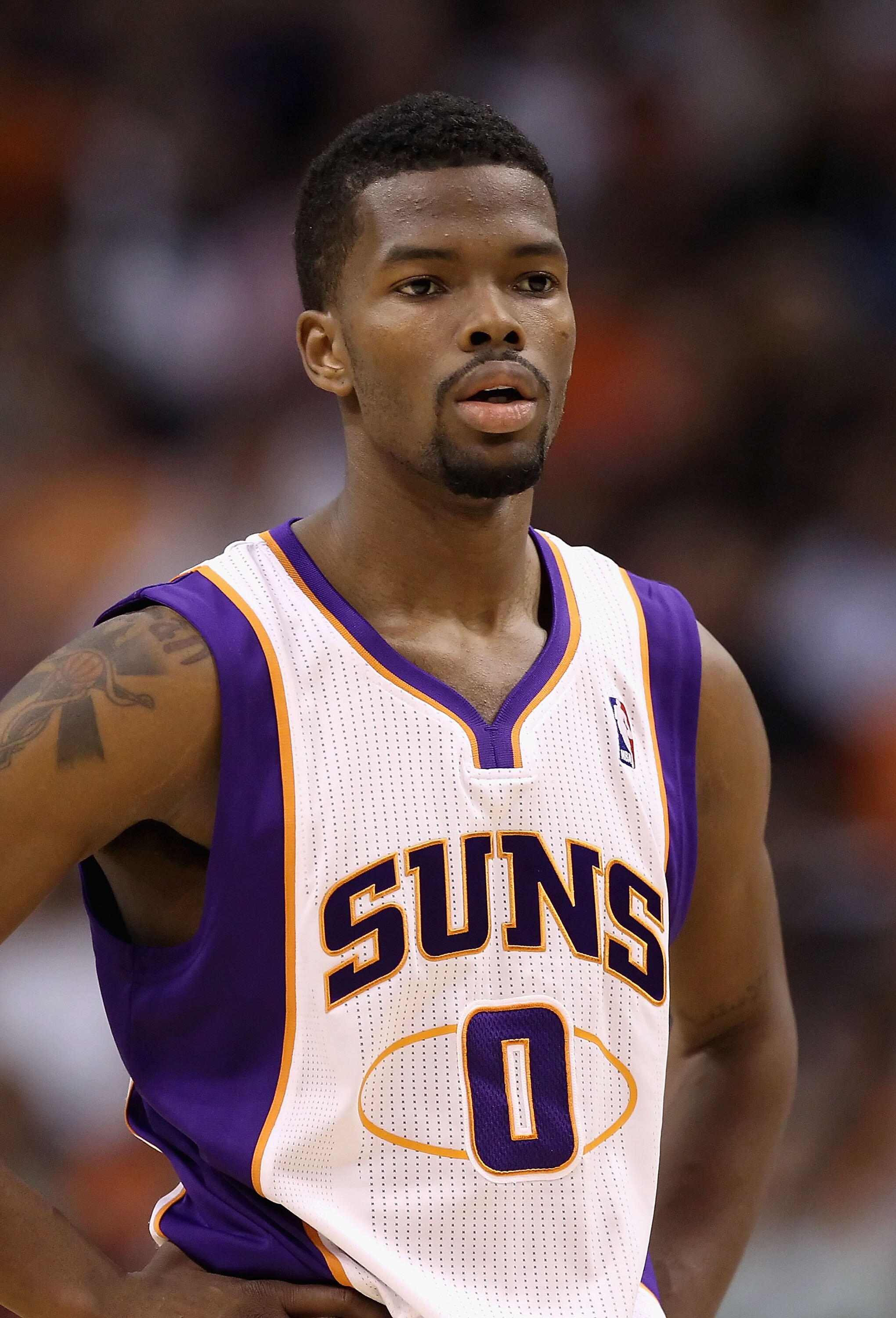 PHOENIX, AZ - MARCH 13:  Aaron Brooks #0 of the Phoenix Sun during the NBA game against the Orlando Magic at US Airways Center on March 13, 2011 in Phoenix, Arizona. The Magic defeated the Suns 111-88. NOTE TO USER: User expressly acknowledges and agrees 