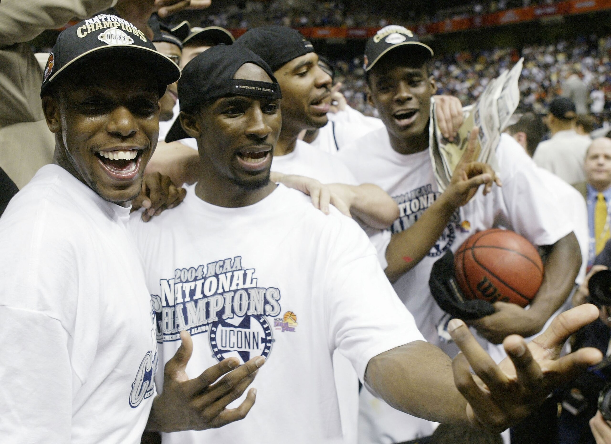 SAN ANTONIO - APRIL 5:  (L-R) Taliek Brown #12, Ben Gordon #4 and Emeka Okafor #50 of the UConn Huskies celebrate after defeating the Georgia Tech Yellow Jackets 82-73 during the National Championship game of the NCAA Men's Final Four Tournament at the Al