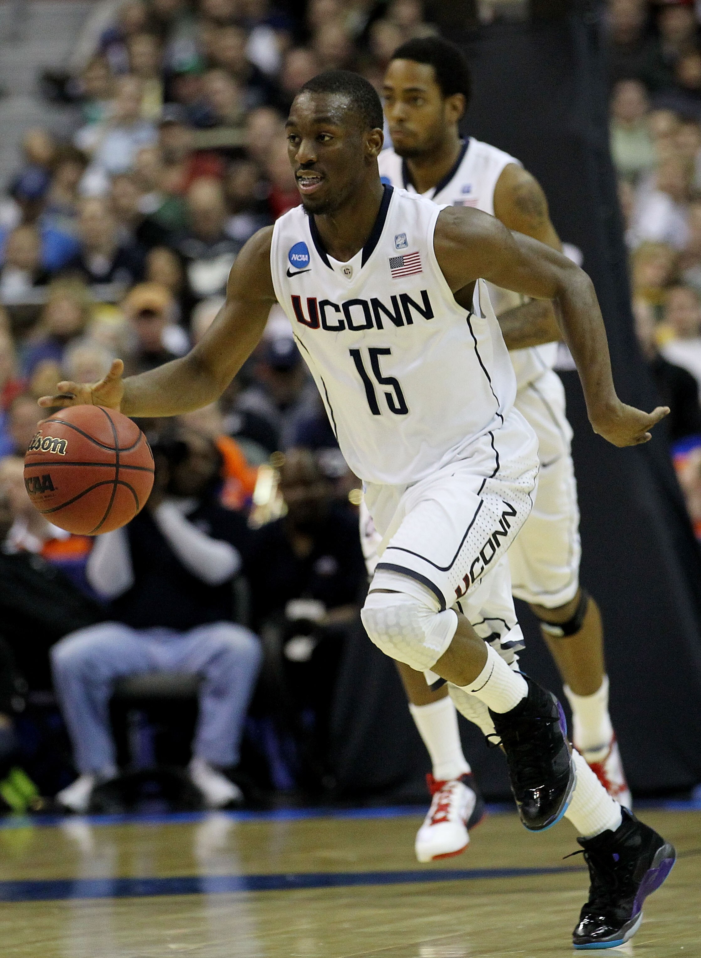 WASHINGTON - MARCH 17:  Kemba Walker #15 of the Connecticut Huskies brings the ball down the court against the Bucknell Bison during the second round of the 2011 NCAA men's basketball tournament at the Verizon Center on March 17, 2011 in Washington, DC.