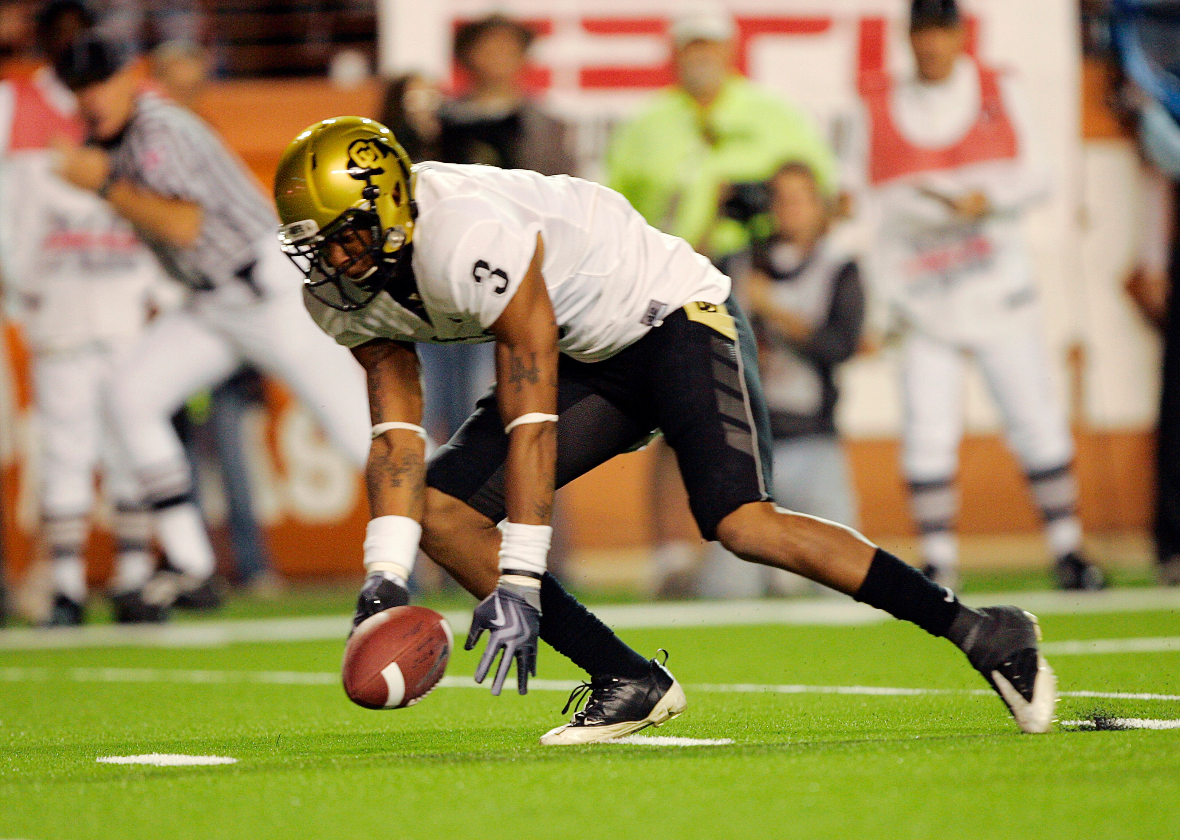 AUSTIN, TX - OCTOBER 10: Cornerback Jimmy Smith #3 of the Colorado Buffaloes picks up the loose ball which was knocked out of the hand of quarterback Colt McCoy of the Texas Longhorns as he rolled out in the second quarter on October 10, 2009 at Darrell K