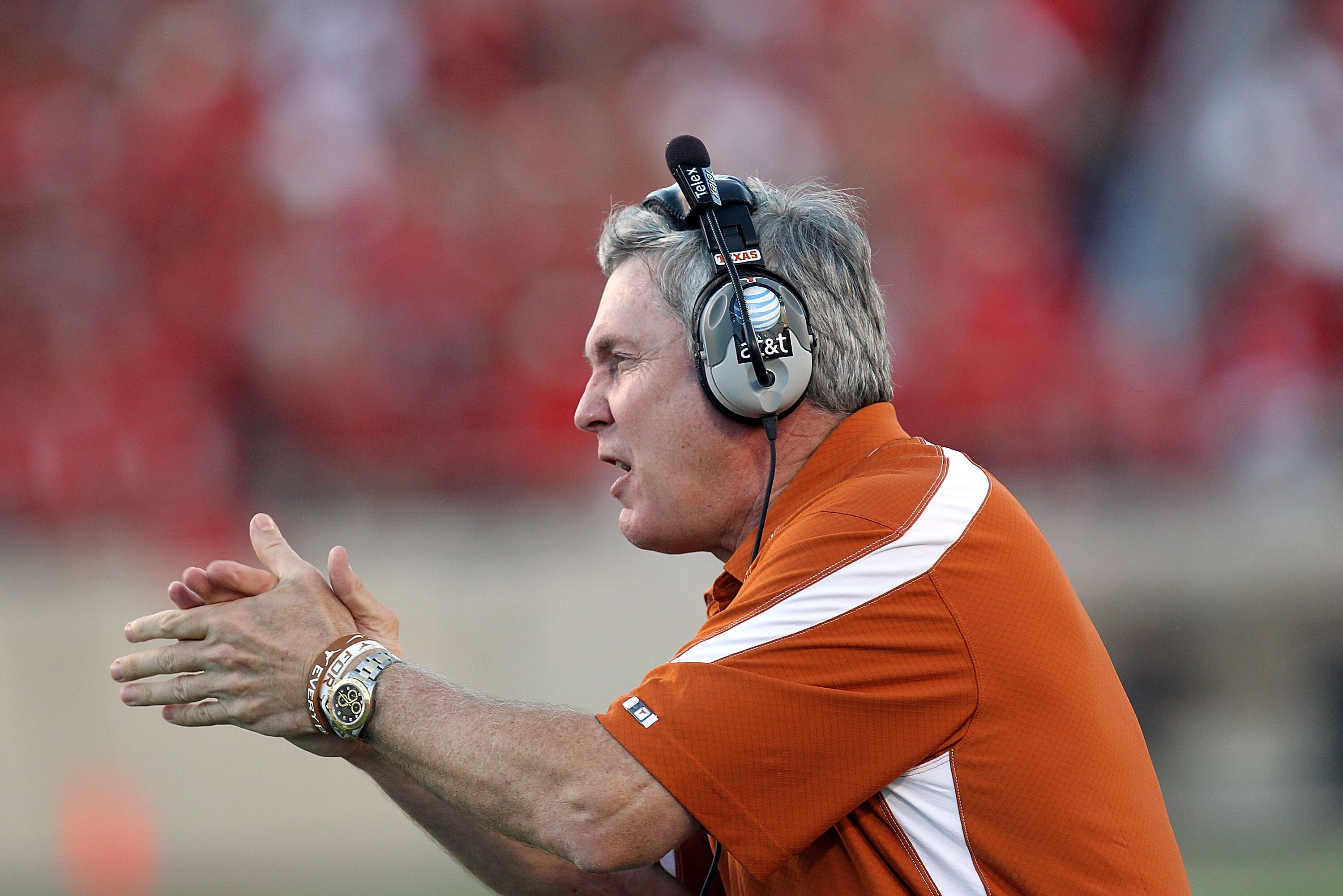 LUBBOCK, TX - SEPTEMBER 18:  Head coach Mack Brown of the Texas Longhorns reacts on the sidelines against the Texas Tech Red Raiders at Jones AT&T Stadium on September 18, 2010 in Lubbock, Texas.  (Photo by Ronald Martinez/Getty Images)