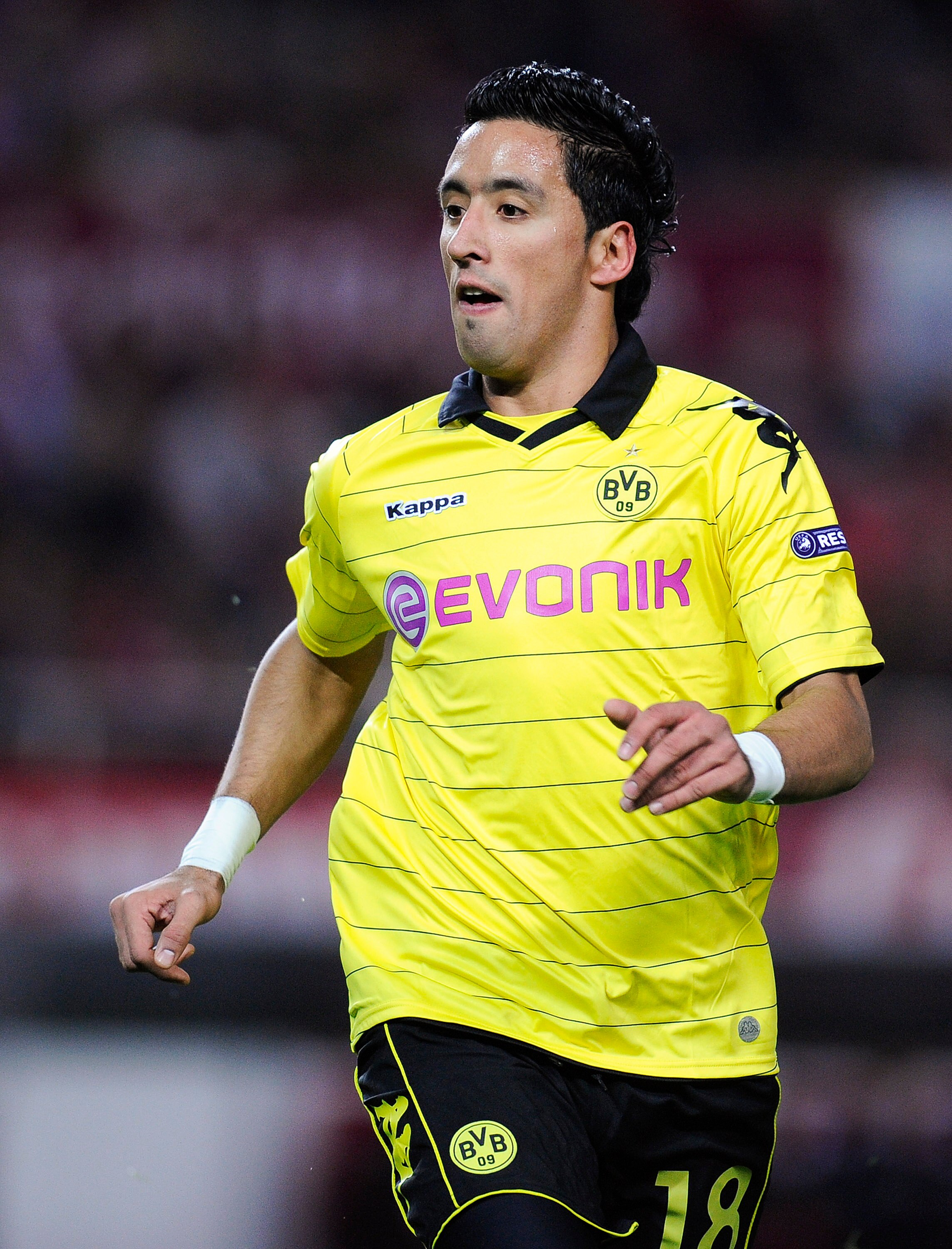 SEVILLE, SPAIN - DECEMBER 15:  Lucas Barrios of Borussia Dortmund runs during the UEFA Europa League group J match between Sevilla and Borussia Dortmund at Estadio Ramon Sanchez Pizjuan on December 15, 2010 in Seville, Spain. The match ended 2-2.  (Photo