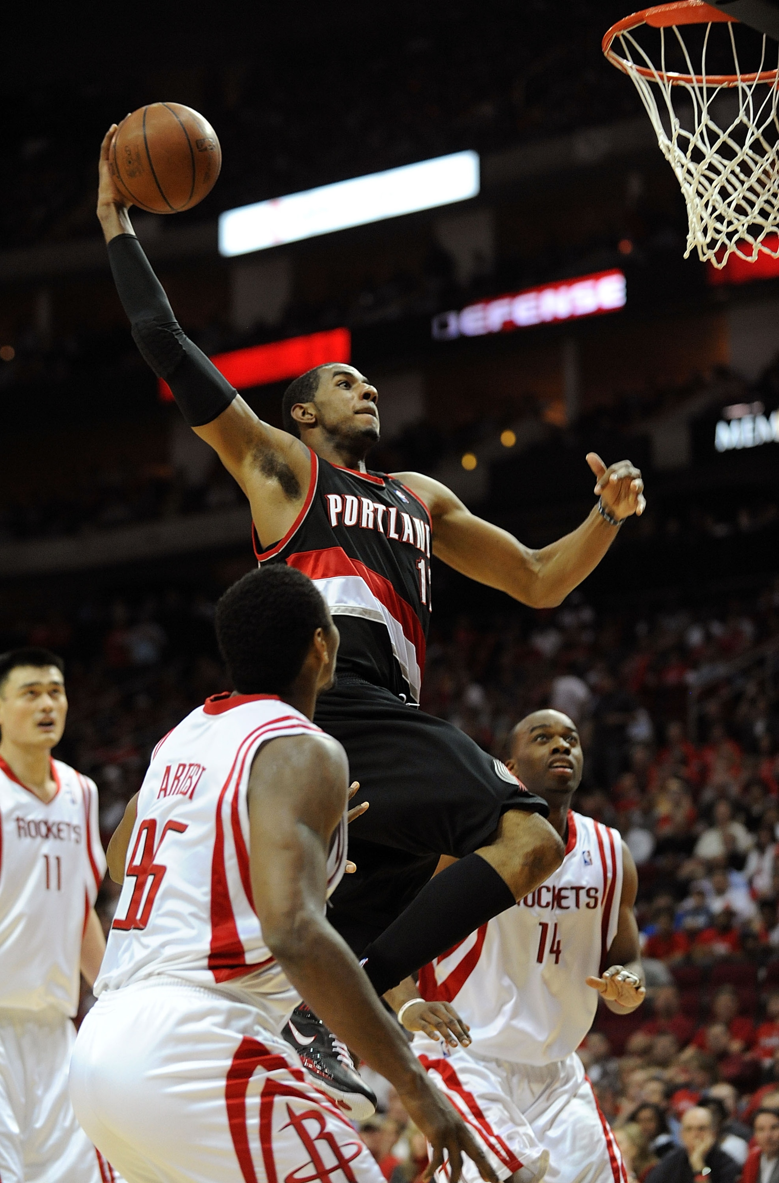 HOUSTON - APRIL 24: Forward LaMarcus Aldridge #12 of the Portland Trail Blazers makes the slam dunk against Ron Artest #96 of the Houston Rockets in Game Three of the Western Conference Quarterfinals during the 2009 NBA Playoffs at Toyota Center on April HOUSTON - APRIL 24: Forward LaMarcus Aldridge #12 of the Portland Trail Blazers makes the slam dunk against Ron Artest #96 of the Houston Rockets in Game Three of the Western Conference Quarterfinals during the 2009 NBA Playoffs at Toyota Center on April