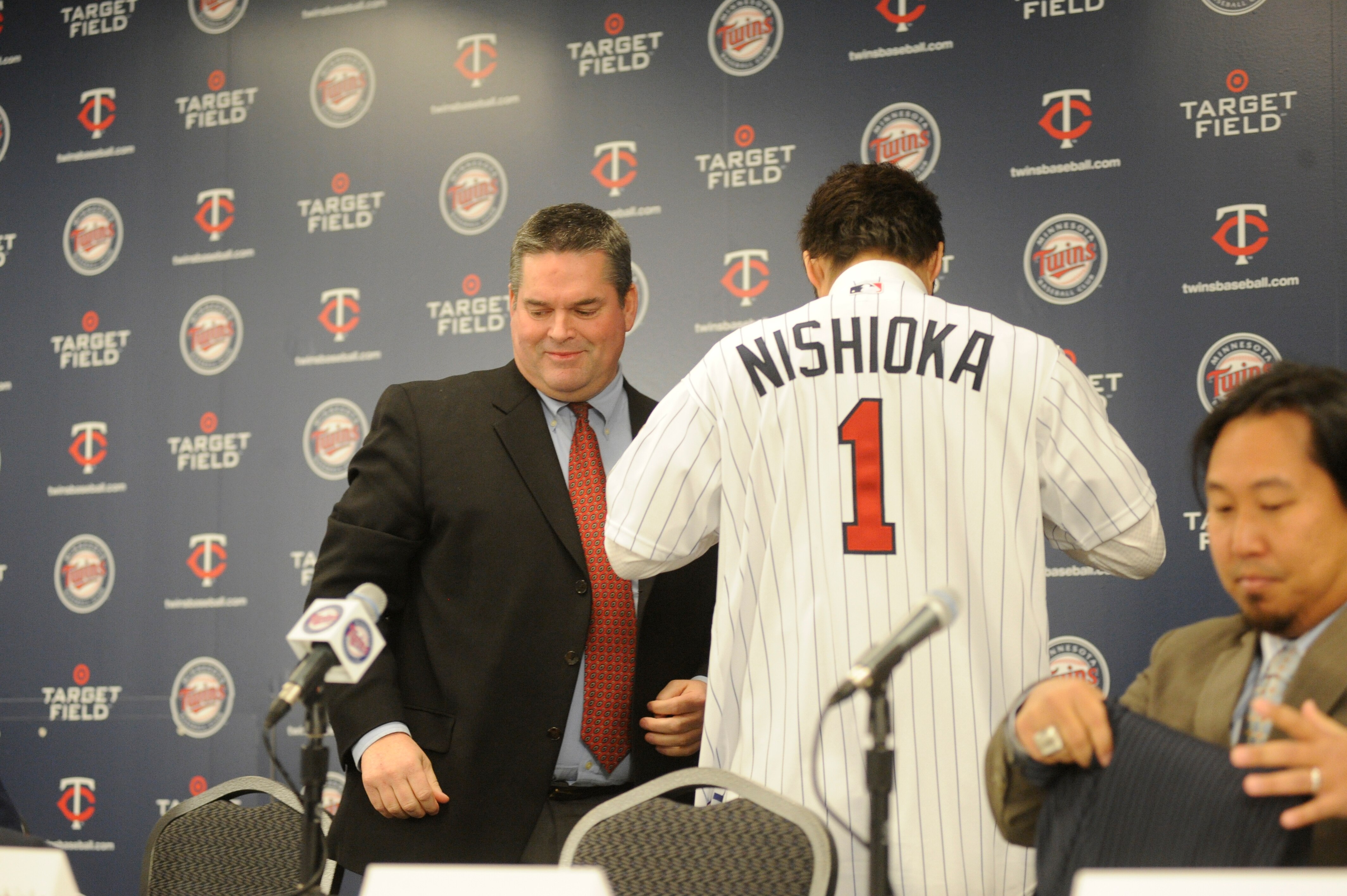 MINNEAPOLIS, MN - DECEMBER 18: Tsuyoshi Nishioka # of the Minnesota Twins puts on his first Twins jersey during a press conference on December 18, 2010 at Target Field in Minneapolis, Minnesota. (Photo by Hannah Foslien /Getty Images)