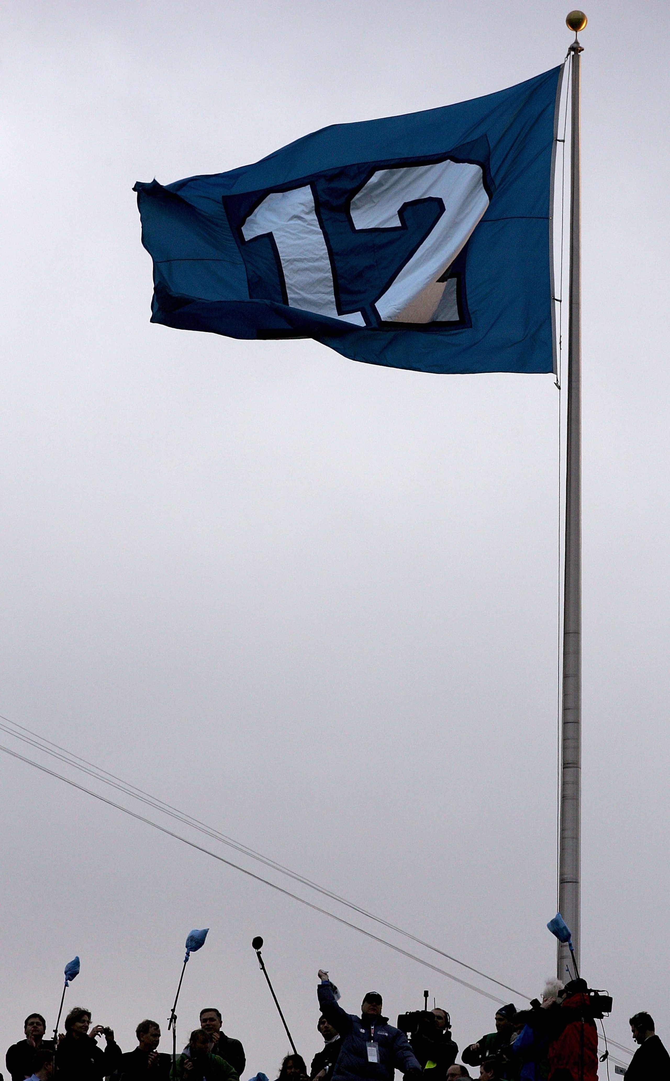 SEATTLE - JANUARY 22:  A flag representing the '12th man' in honor of Seattle Seahawks fans flies at the NFC Championship Game between the Seattle Seahawks and the Carolina Panthers at Qwest Stadium on January 22, 2006 in Seattle, Washington.  (Photo by H