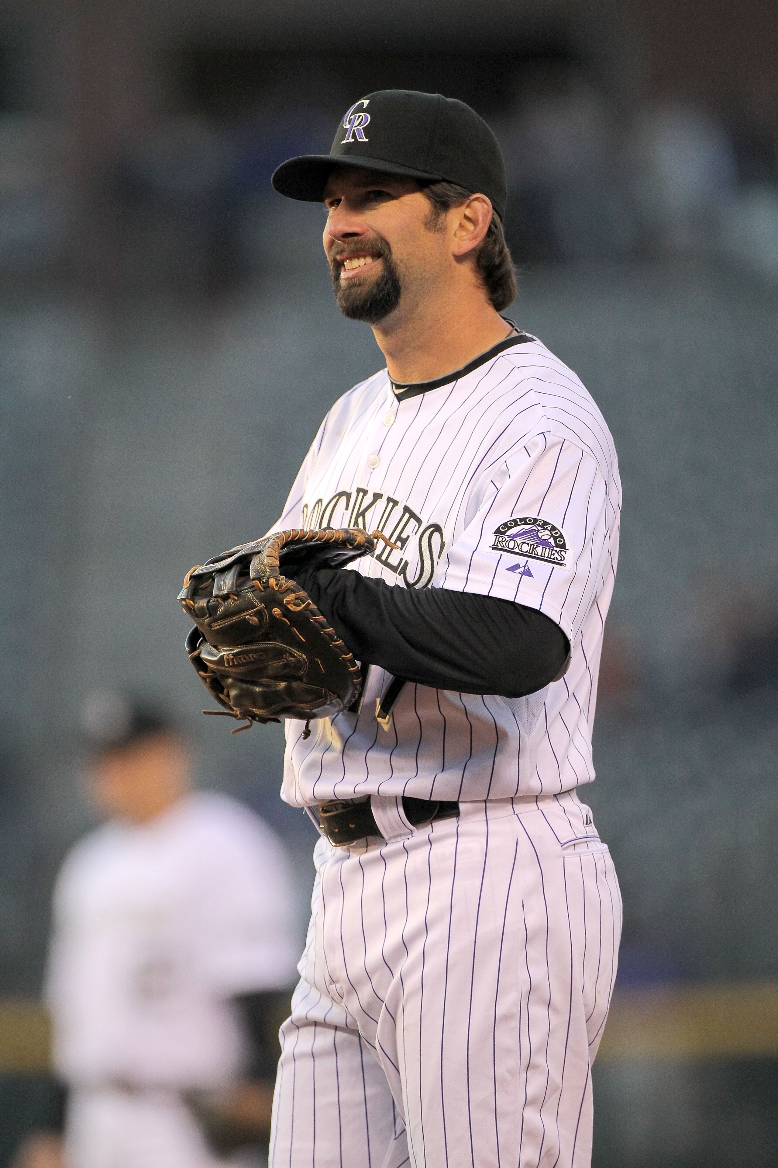 DENVER - APRIL 13: Todd Helton #17 of the Colorado Rockies looks on as he defends against the New York Mets during Major League Baseball action at Coors Field on April 13, 2010 in Denver, Colorado. (Photo by Doug Pensinger/Getty Images) DENVER - APRIL 13: Todd Helton #17 of the Colorado Rockies looks on as he defends against the New York Mets during Major League Baseball action at Coors Field on April 13, 2010 in Denver, Colorado. (Photo by Doug Pensinger/Getty Images)