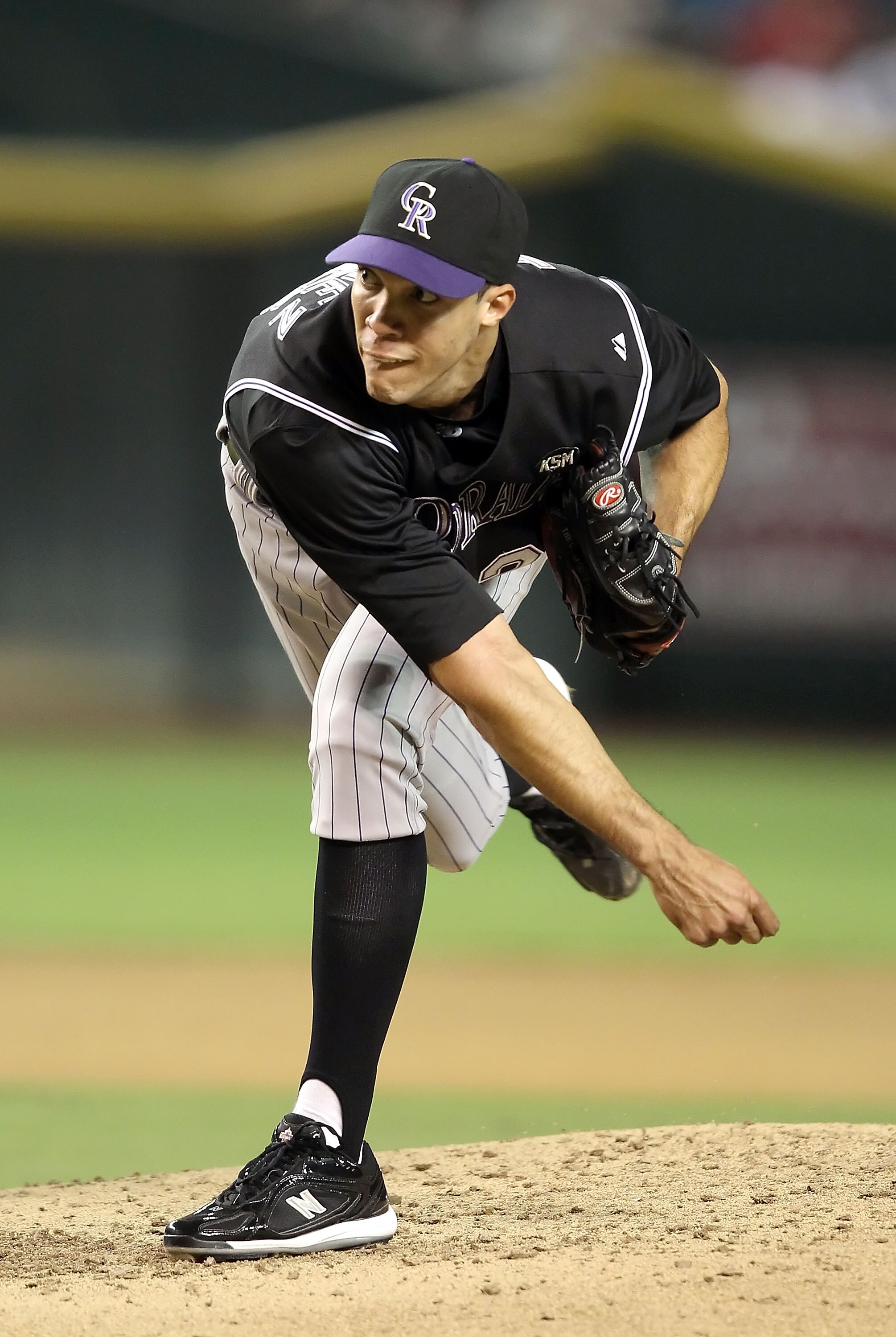 PHOENIX - SEPTEMBER 22:  Starting pitcher Ubaldo Jimenez #38 of the Colorado Rockies pitches against the Arizona Diamondbacks during the Major League Baseball game at Chase Field on September 22, 2010 in Phoenix, Arizona.  (Photo by Christian Petersen/Get
