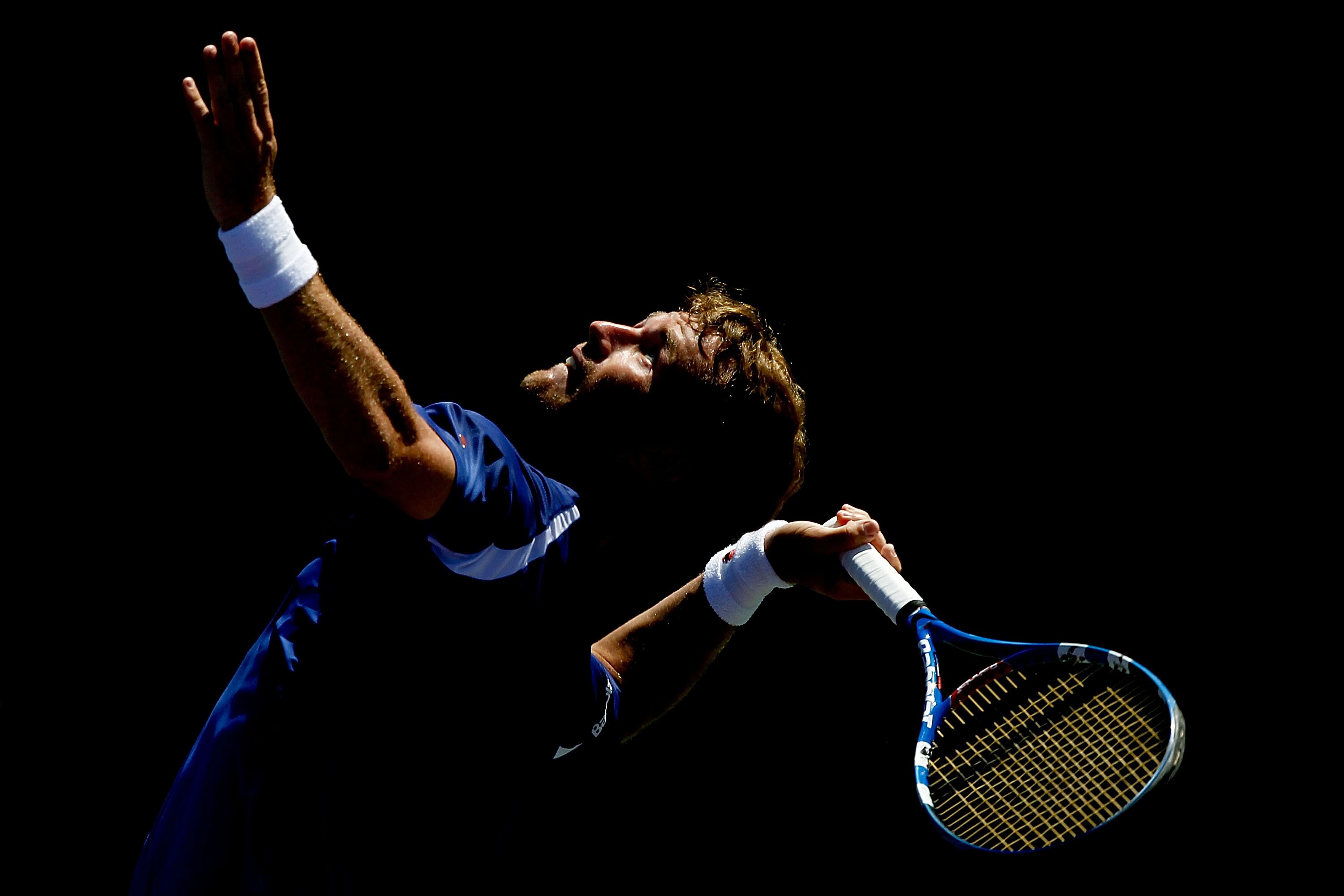 KEY BISCAYNE, FL - MARCH 23:  Daniel Gimeno-Traver of Spain serves against Julien Benneteau of France during the Sony Ericsson Open at Crandon Park Tennis Center on March 23, 2011 in Key Biscayne, Florida.  (Photo by Matthew Stockman/Getty Images)