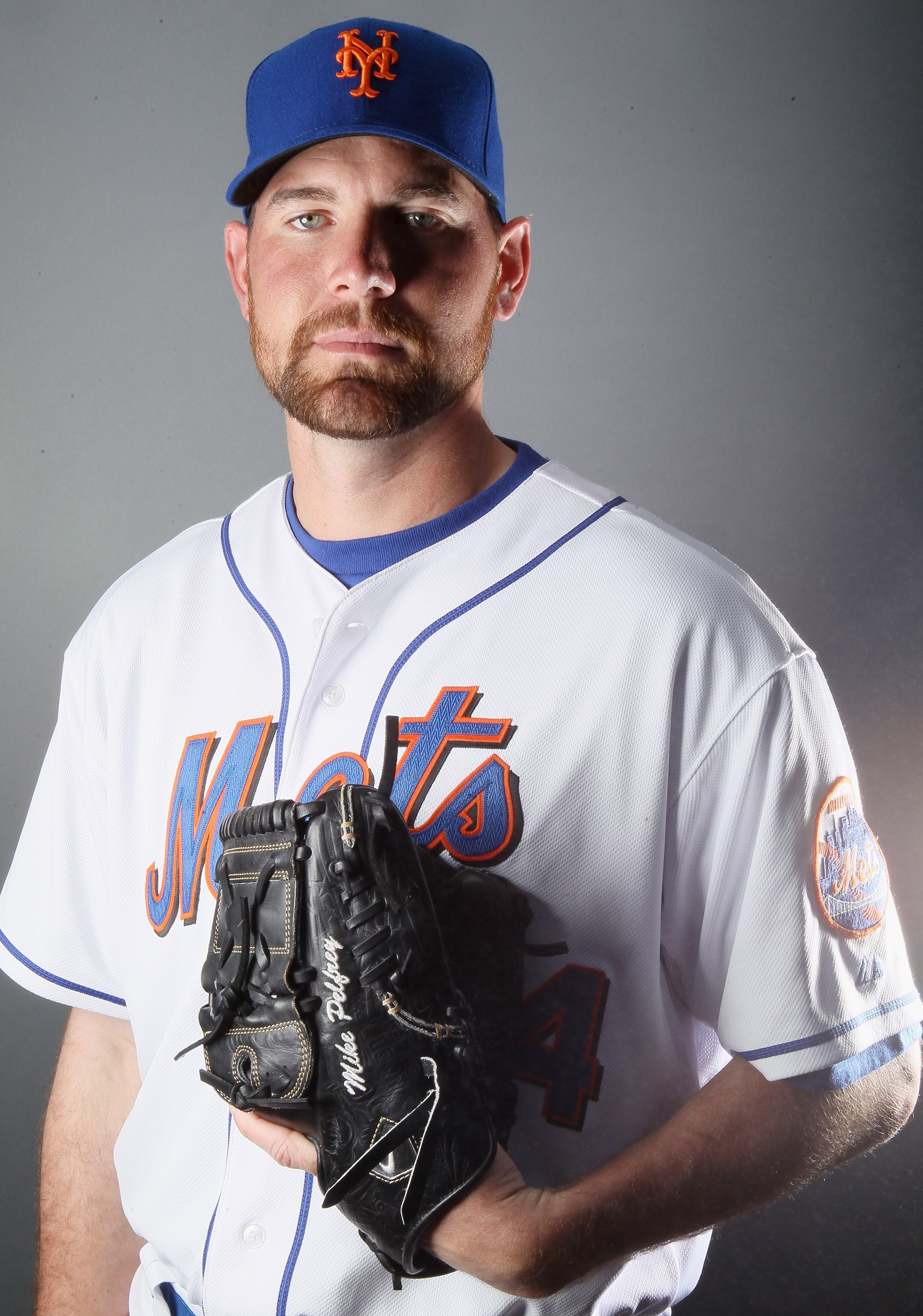 PORT ST. LUCIE, FL - FEBRUARY 24:  RY 24:  Mike Pelfrey #34 of the New York Mets poses for a portrait during the New York Mets Photo Day on February 24, 2011 at Digital Domain Park in Port St. Lucie, Florida.  (Photo by Elsa/Getty Images)