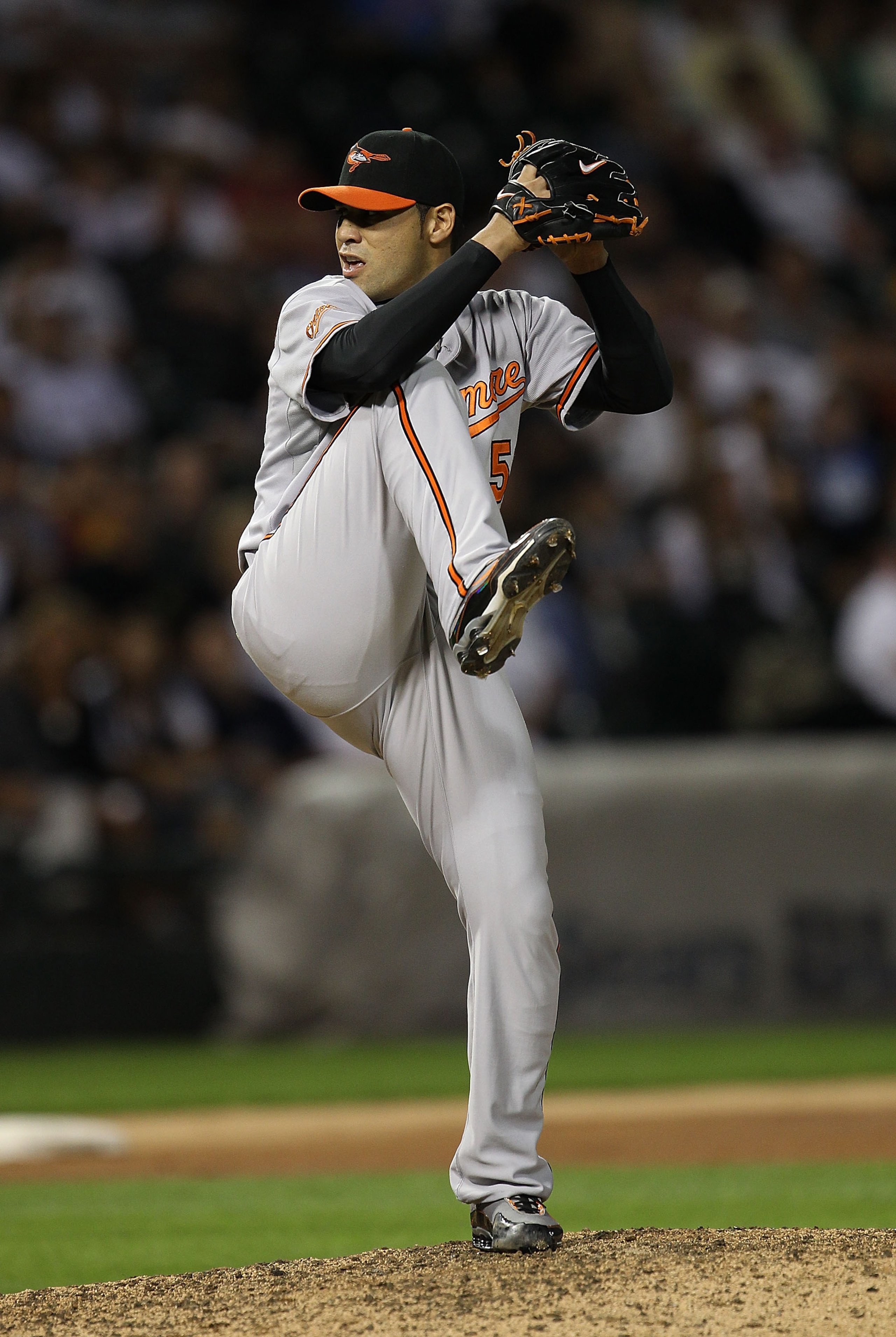 CHICAGO - AUGUST 25: Michael Gonzalez #51 of the Baltimore Orioles pitches against the Chicago White Sox at U.S. Cellular Field on August 25, 2010 in Chicago, Illinois. The Orioles defeated the White Sox 4-2. (Photo by Jonathan Daniel/Getty Images)
