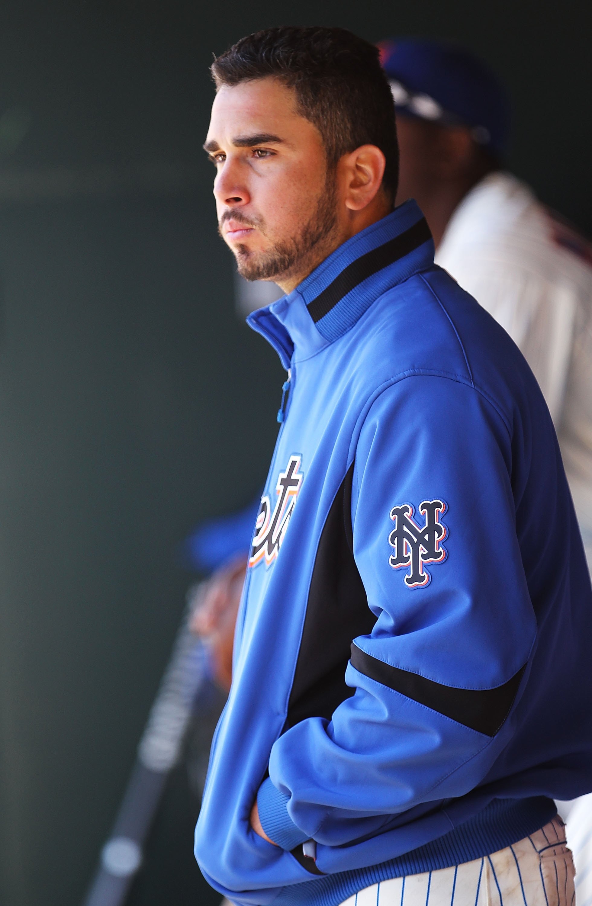 NEW YORK - APRIL 10:  Oliver Perez #46 of the New York Mets looks on in the dugout after being pulled in the fifth inning against the Washington Nationals during their game on April 10, 2010 at Citi Field in the Flushing neighborhood of the Queens borough