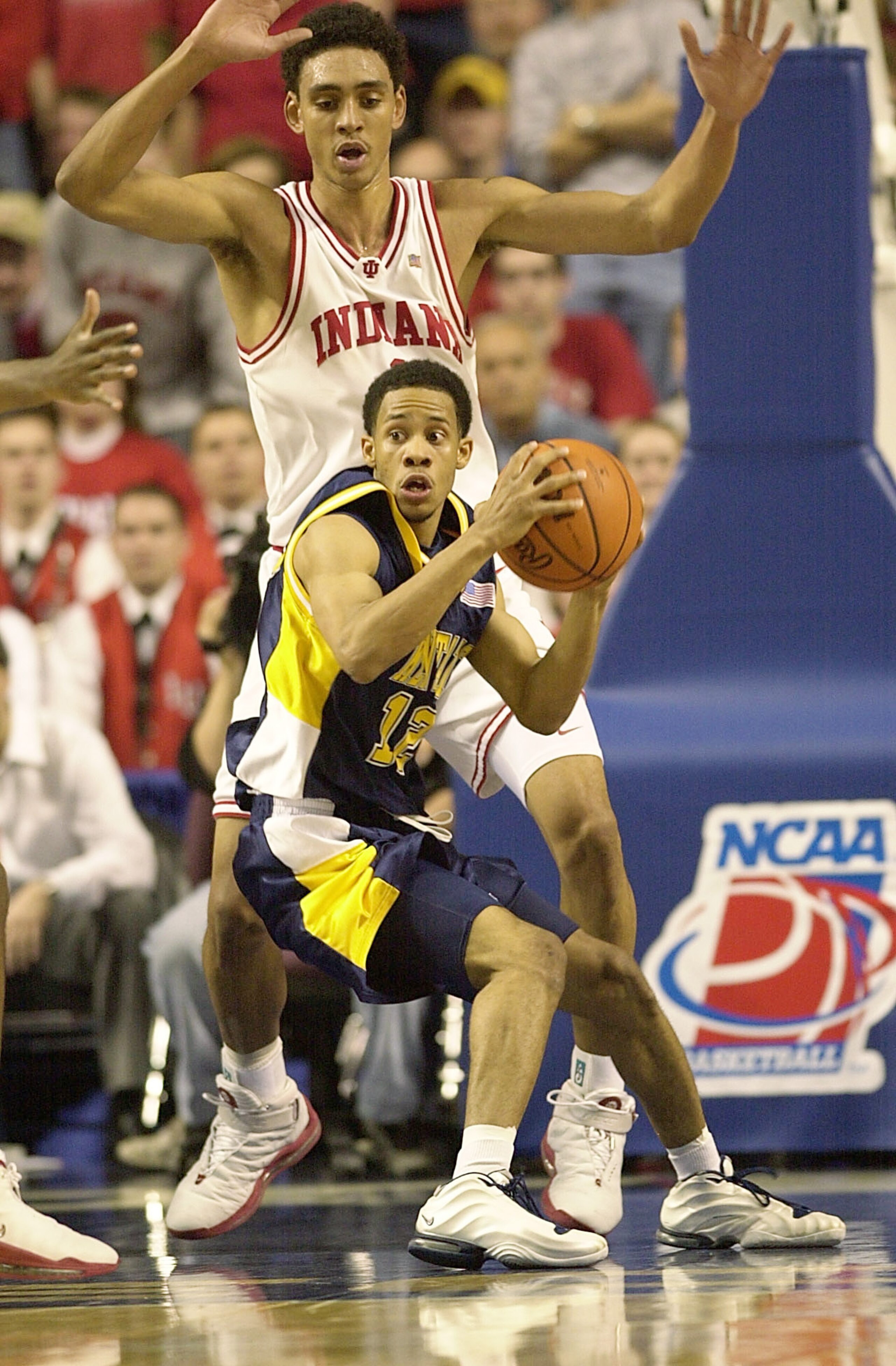 23 Mar 2002:  Andrew Mitchell #12 of the Kent State Golden Eagles is defended by Jared Jeffries #1 in the first half of the Indiana Hoosiers in the Championship of the South Region of the 2002 NCAA Men's Basketball Championship at the Rupp Arena in Lexing