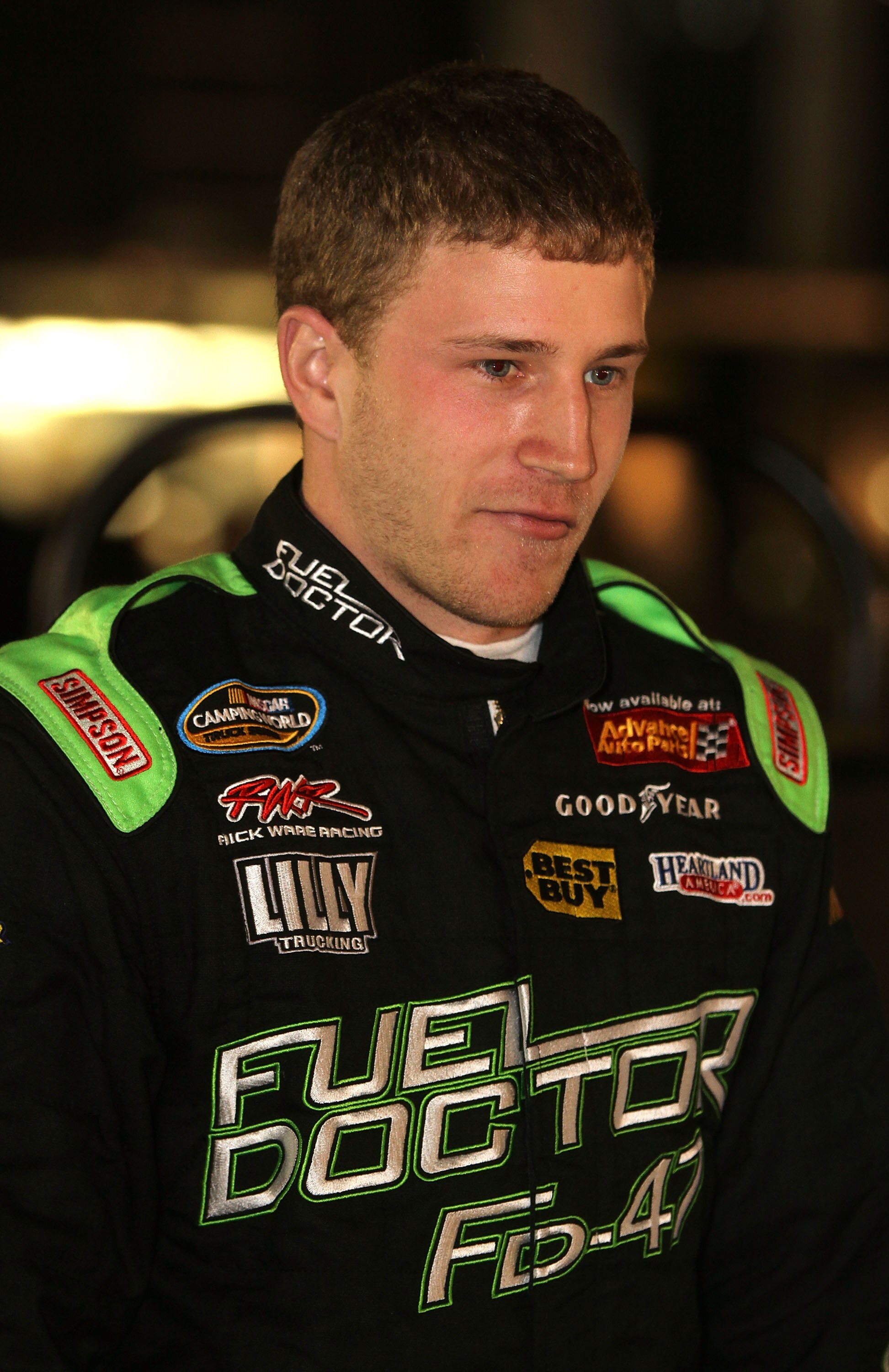 DAYTONA BEACH, FL - FEBRUARY 16:  Jeffrey Earnhardt, driver of the #1 Fuel Doctor Platinum Chevrolet, looks on in the garage area during practice for the NASCAR Camping World Truck Series NextEra Energy Resources 250 at Daytona International Speedway on F