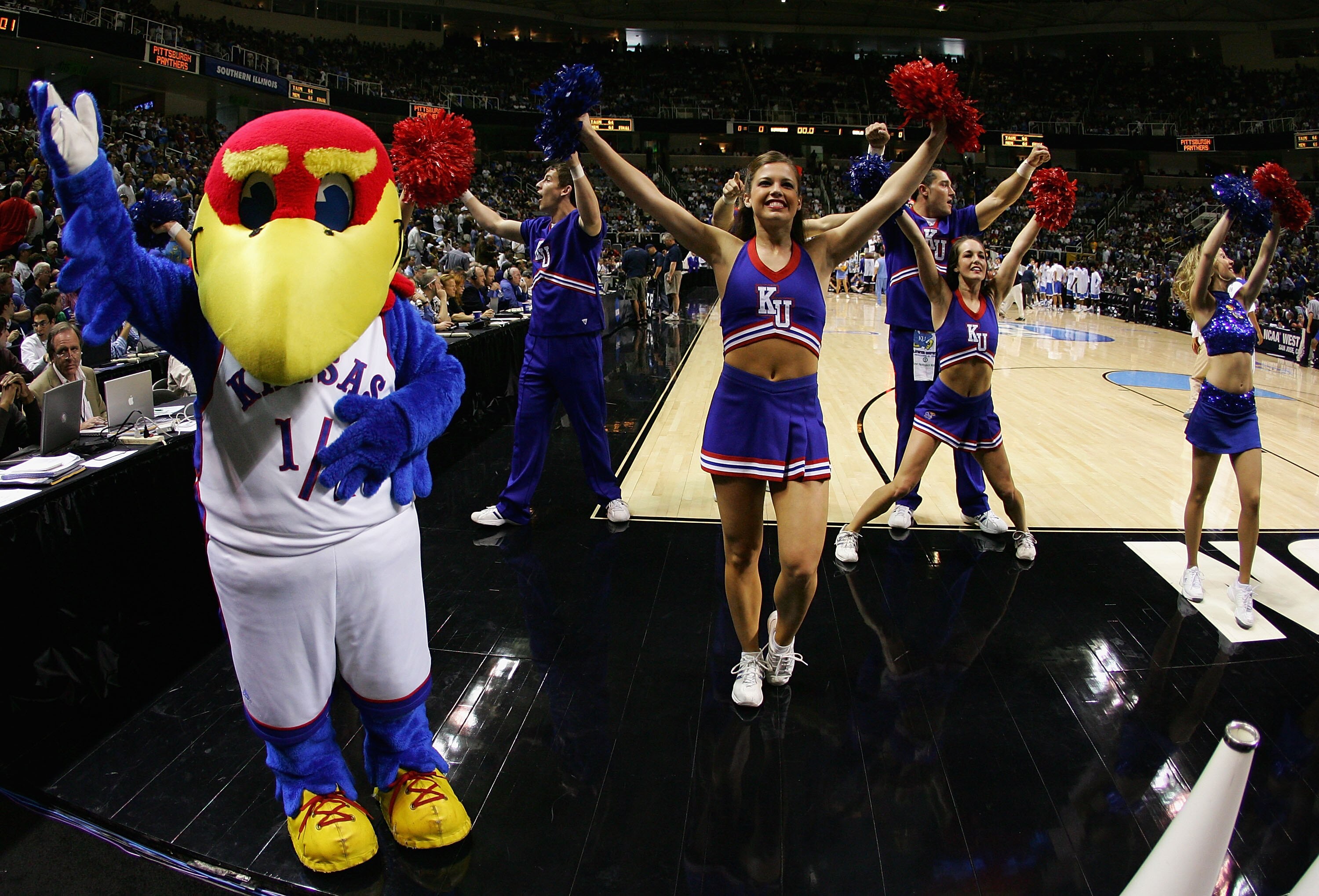 SAN JOSE, CA - MARCH 24:  The Kansas Jayhawks mascot and cheerleaders perform before the west regional final of the NCAA Men's Basketball Tournament against the UCLA Bruins at the HP Pavilion on March 24, 2007 in San Jose, California.    (Photo by Lisa Bl