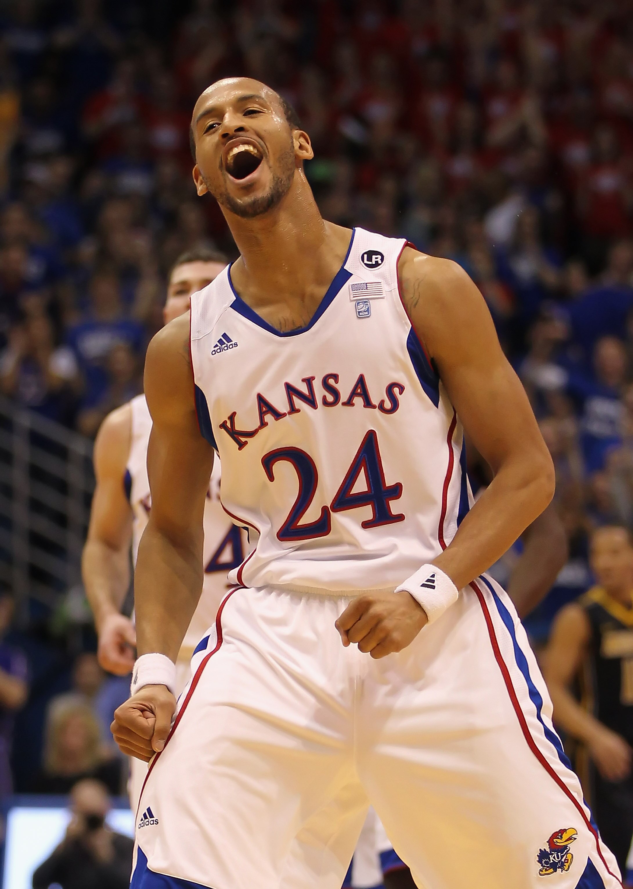 LAWRENCE, KS - FEBRUARY 07:  Travis Releford #24 of the Kansas Jayhawks reacts after making a shot during the game against the Missouri Tigers on February 5, 2011 at Allen Fieldhouse in Lawrence, Kansas.  (Photo by Jamie Squire/Getty Images)
