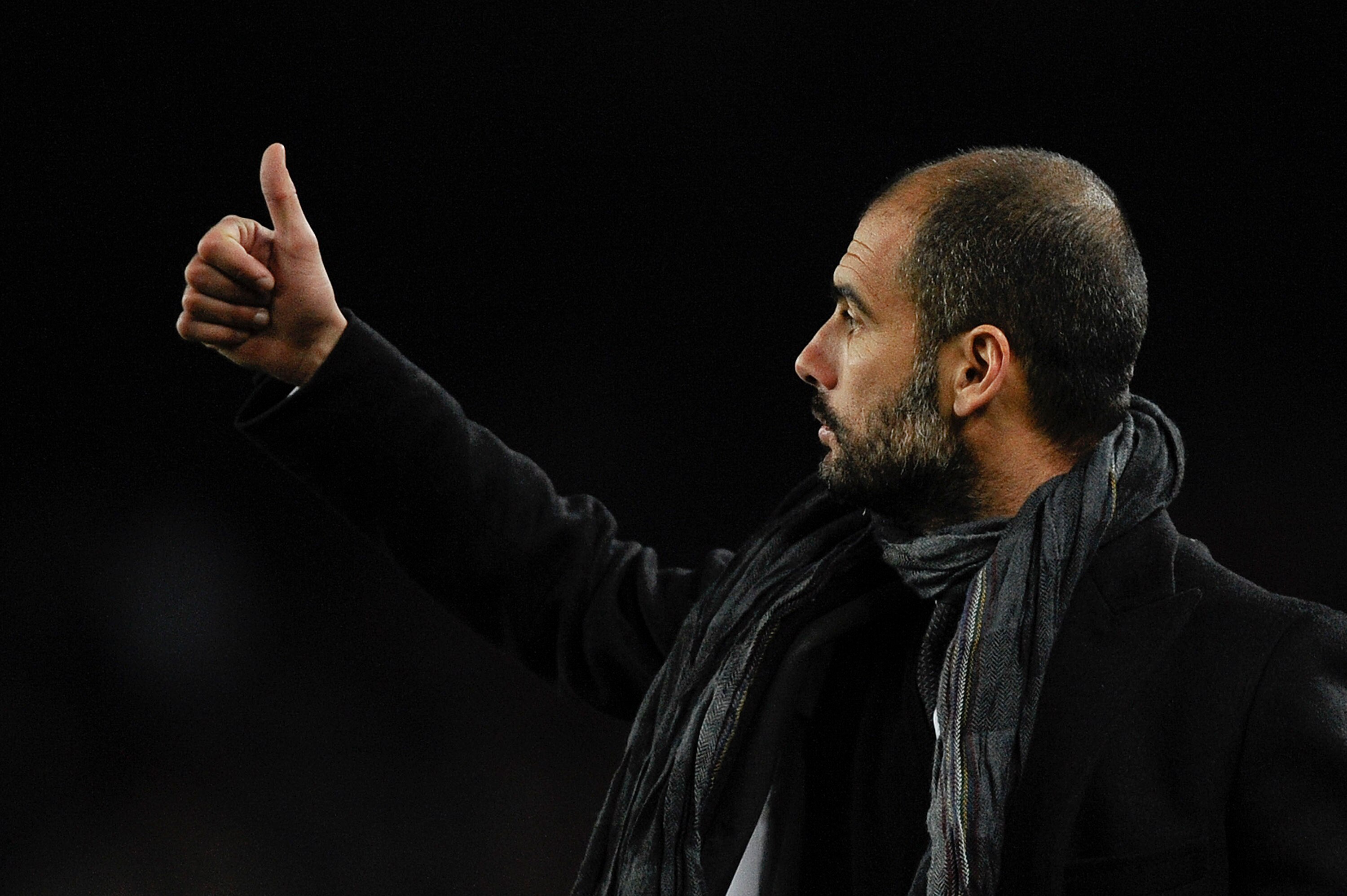 BARCELONA, SPAIN - JANUARY 26:  Head coach Josep Guardiola of Barcelona gives his thumbs up during the Copa del Rey Semi Final First Leg match between Barcelona and Almeria at Camp Nou on January 26, 2011 in Barcelona, Spain. Barcelona won 5-0.  (Photo by