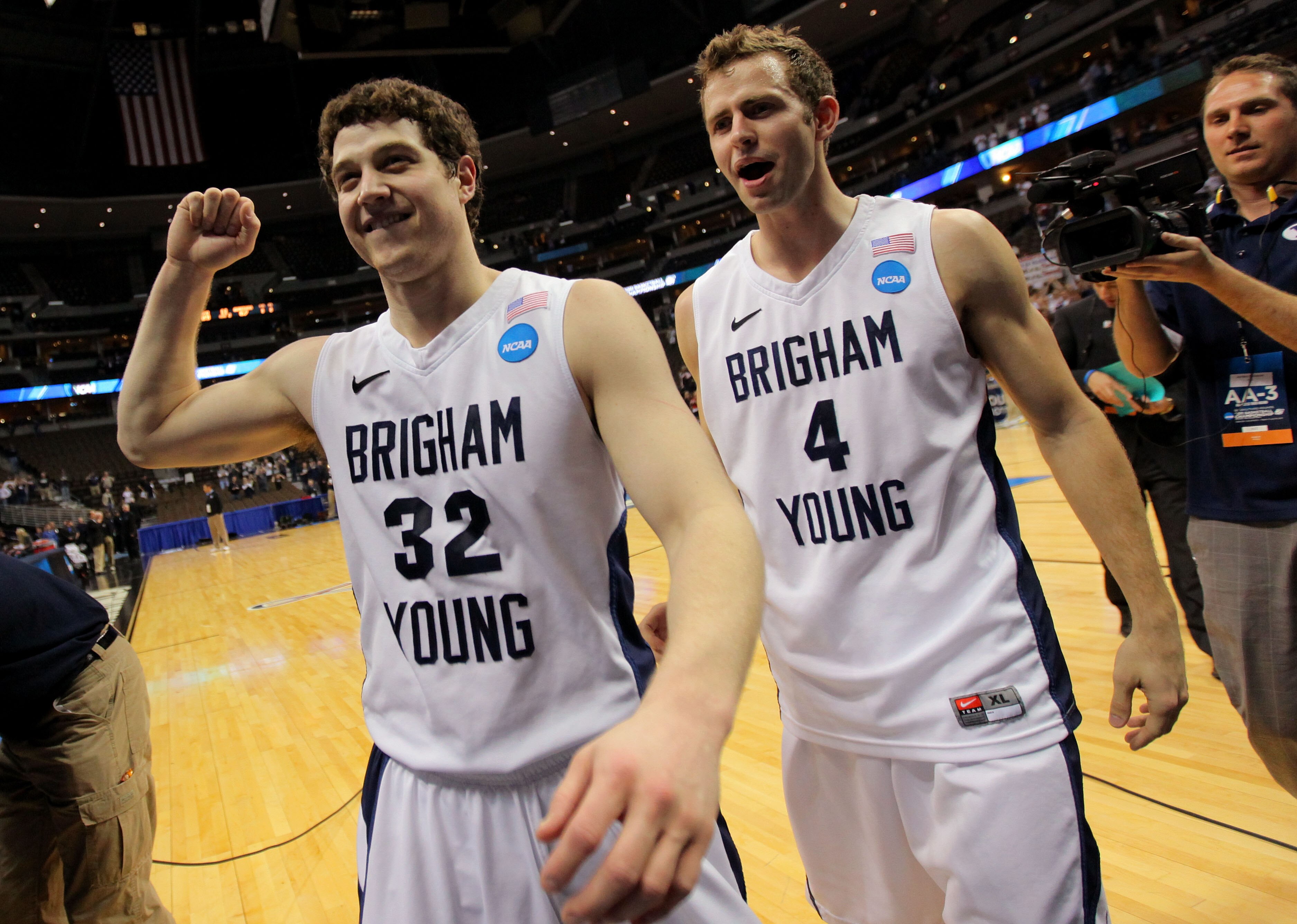 DENVER, CO - MARCH 19: Jimmer Fredette #32 and Jackson Emery #4 of the Brigham Young Cougars walk off of the court after defeating the Gonzaga Bulldogs during the third round of the 2011 NCAA men's basketball tournament at Pepsi Center on March 19, 2011 DENVER, CO - MARCH 19: Jimmer Fredette #32 and Jackson Emery #4 of the Brigham Young Cougars walk off of the court after defeating the Gonzaga Bulldogs during the third round of the 2011 NCAA men's basketball tournament at Pepsi Center on March 19, 2011