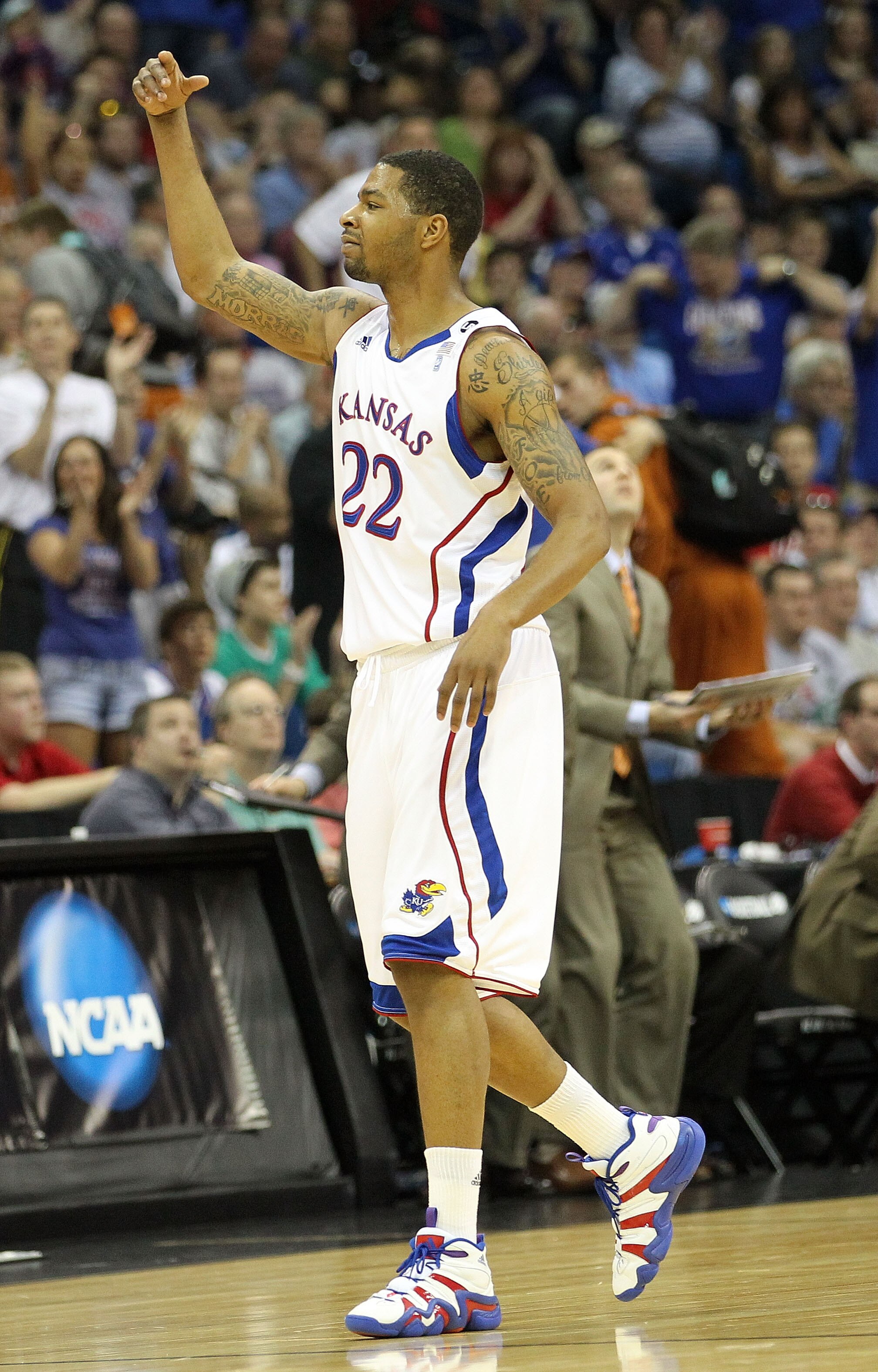 TULSA, OK - MARCH 20: Marcus Morris #22 of the Kansas Jayhawks reacts to a play against the Illinois Fighting Illini during the third round of the 2011 NCAA men's basketball tournament at BOK Center on March 20, 2011 in Tulsa, Oklahoma. (Photo by Ronald TULSA, OK - MARCH 20: Marcus Morris #22 of the Kansas Jayhawks reacts to a play against the Illinois Fighting Illini during the third round of the 2011 NCAA men's basketball tournament at BOK Center on March 20, 2011 in Tulsa, Oklahoma. (Photo by Ronald