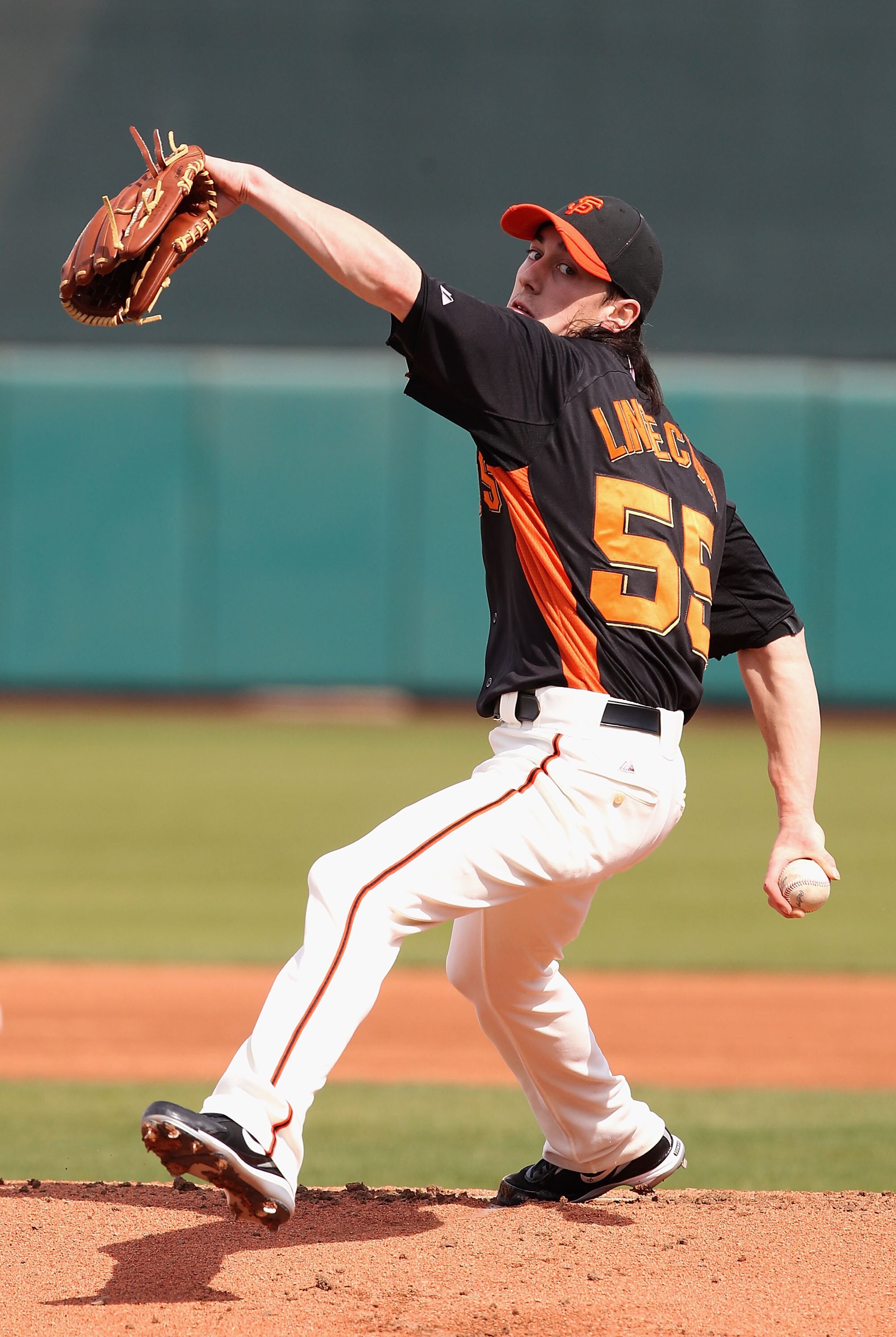 SCOTTSDALE, AZ - MARCH 01:  Starting pitcher Tim Lincecum #55 of the San Francisco Giants pitches against the Chicago Cubs during the spring training game at Scottsdale Stadium on March 1, 2011 in Scottsdale, Arizona.  (Photo by Christian Petersen/Getty I