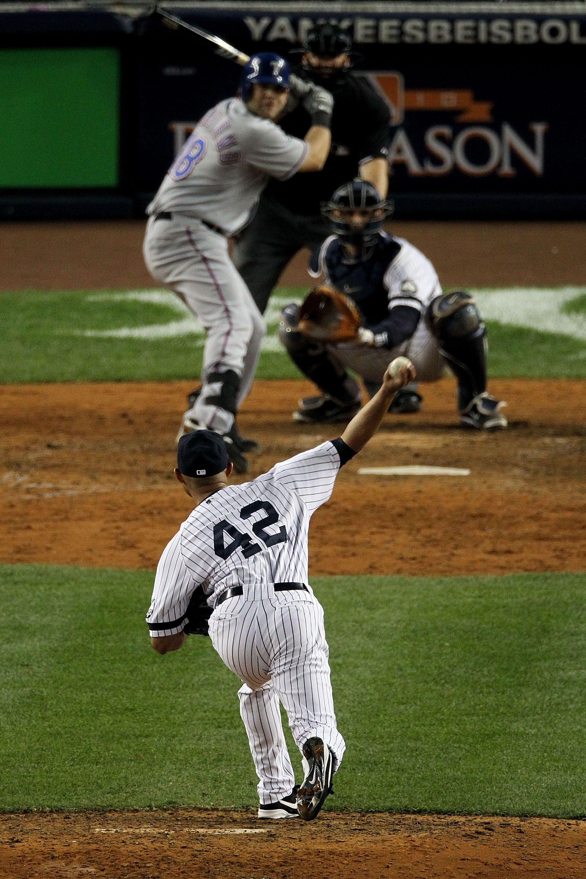 NEW YORK - OCTOBER 20:  Mariano Rivera #42 of the New York Yankees pitches against the Texas Rangers in Game Five of the ALCS during the 2010 MLB Playoffs at Yankee Stadium on October 20, 2010 in the Bronx borough of New York City.  (Photo by Nick Laham/G