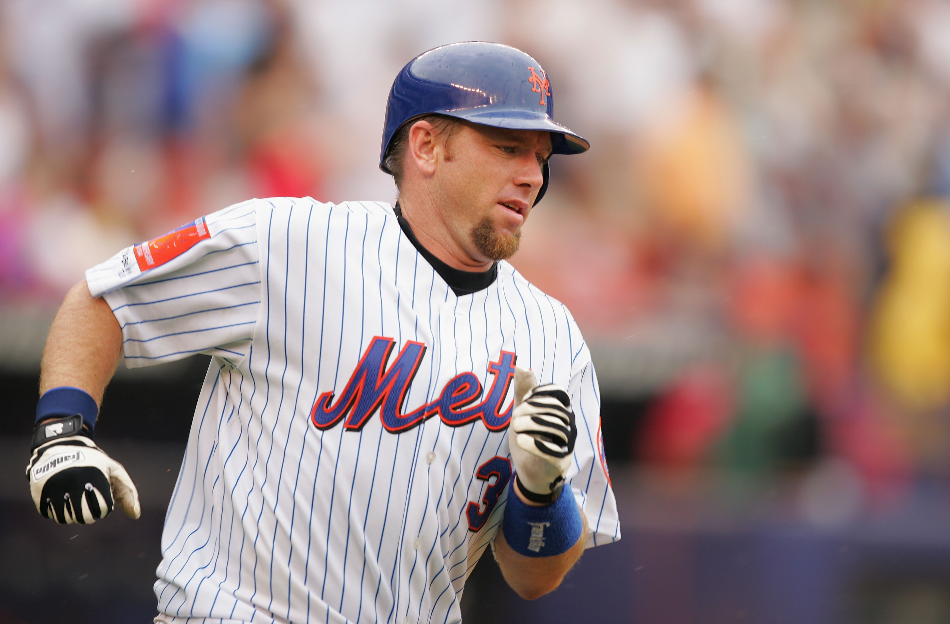 NEW YORK - JULY 18:  Vance Wilson #3 of the New York Mets circles the bases after hitting a home run off of Brett Myers of the Philadelphia Phillies on July 18, 2004 at Shea Stadium in Flushing, New York. (Photo by Al Bello/Getty Images)