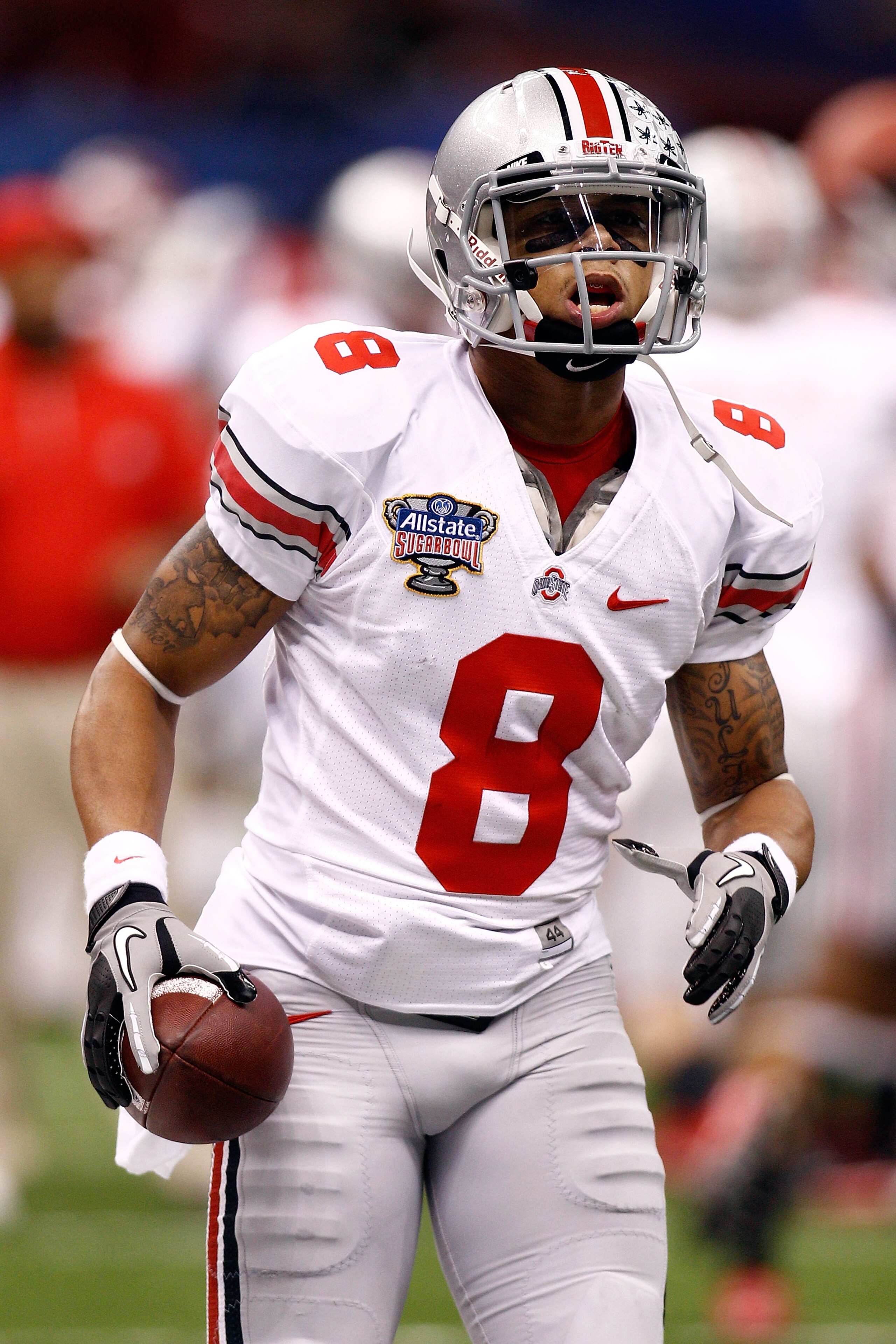 NEW ORLEANS, LA - JANUARY 04: DeVier Posey #8 of the Ohio State Buckeyes looks on before taking on the Arkansas Razorbacks in the Allstate Sugar Bowl at the Louisiana Superdome on January 4, 2011 in New Orleans, Louisiana. (Photo by Chris Graythen/Getty NEW ORLEANS, LA - JANUARY 04: DeVier Posey #8 of the Ohio State Buckeyes looks on before taking on the Arkansas Razorbacks in the Allstate Sugar Bowl at the Louisiana Superdome on January 4, 2011 in New Orleans, Louisiana. (Photo by Chris Graythen/Getty