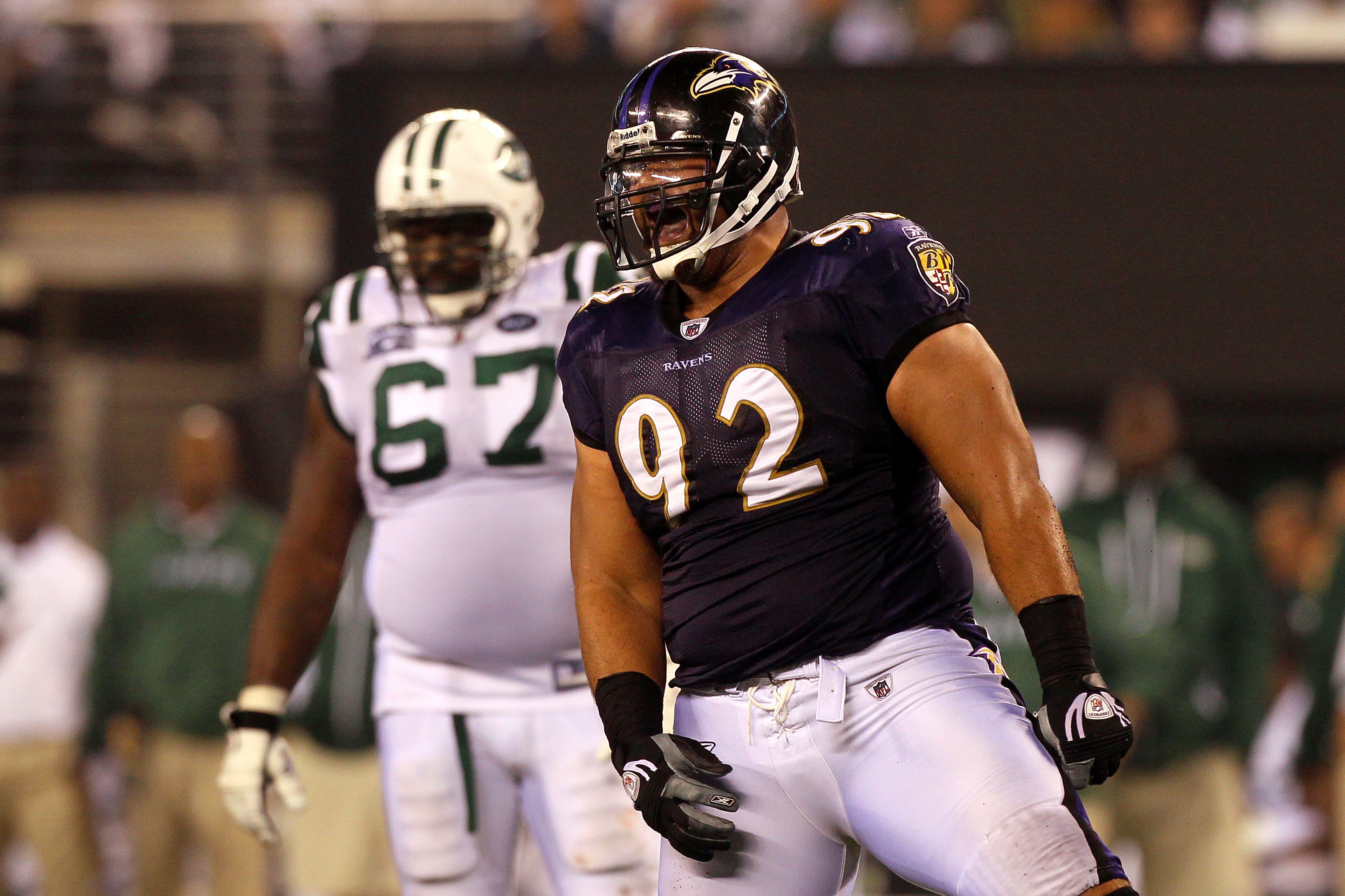 EAST RUTHERFORD, NJ - SEPTEMBER 13:  Haloti Ngata #92 of the Baltimore Ravens celebrates after a play against the New York Jets during their Jets home opener at the New Meadowlands Stadium on September 13, 2010 in East Rutherford, New Jersey.  (Photo by J