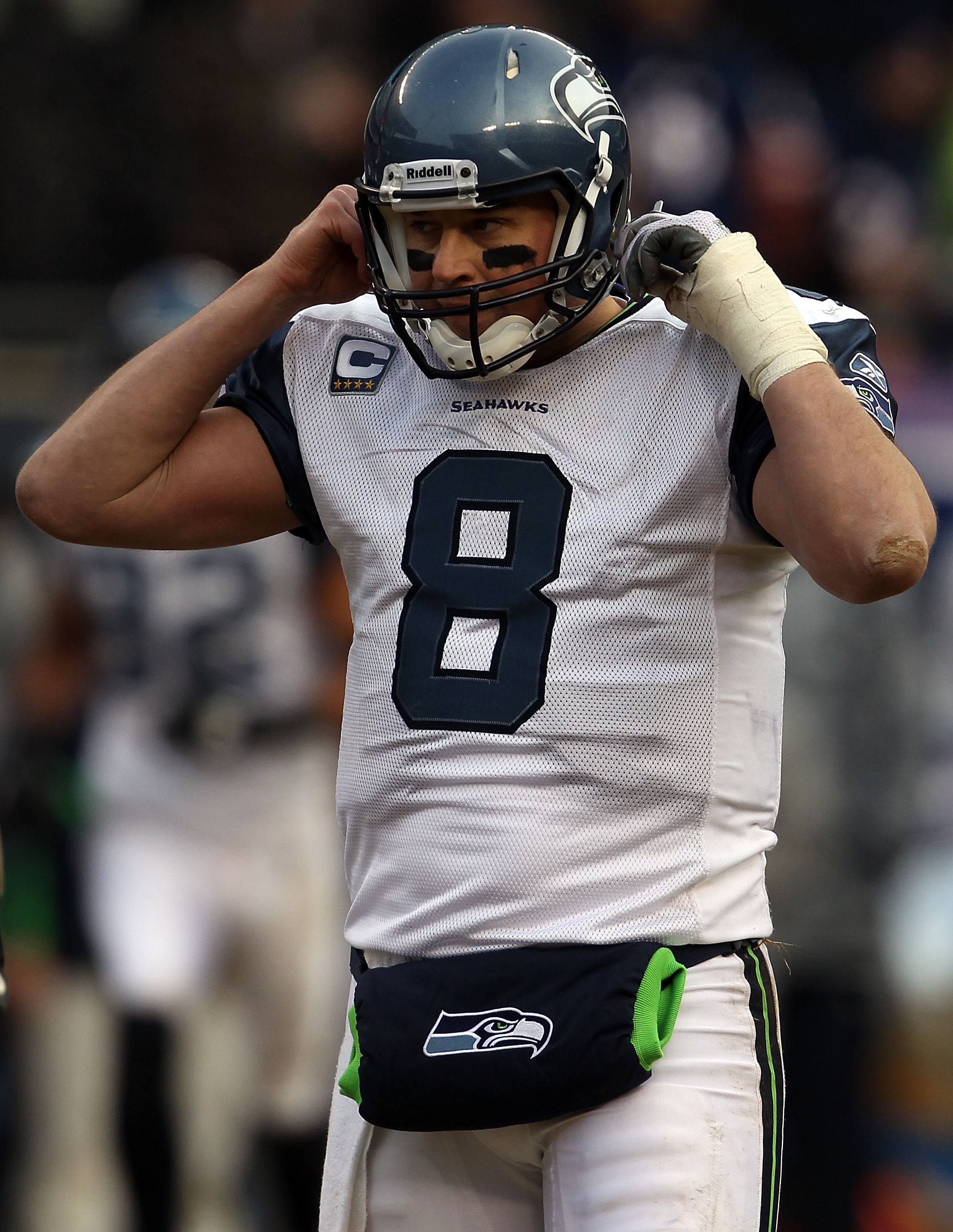 CHICAGO, IL - JANUARY 16:  Quarterback Matt Hasselbeck #8 of the Seattle Seahawks reacts while taking on the Chicago Bears in the 2011 NFC divisional playoff game at Soldier Field on January 16, 2011 in Chicago, Illinois.  (Photo by Jonathan Daniel/Getty