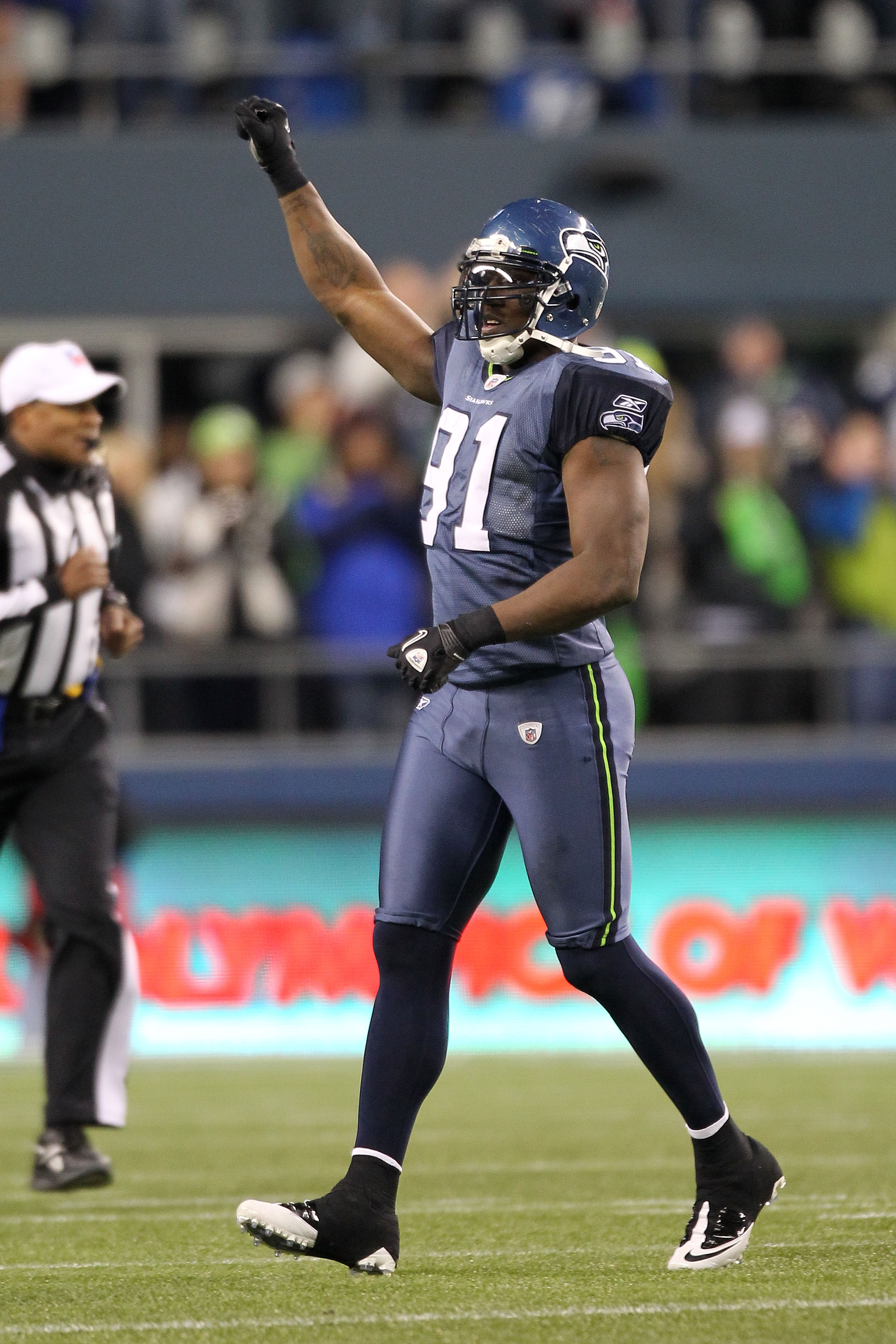 SEATTLE, WA - JANUARY 02:  Defensive end Chris Clemons #91 of the Seattle Seahawks celebrates advancing to the playoffs after defeating the St. Louis Rams 16-6 at Qwest Field on January 2, 2011 in Seattle, Washington.  (Photo by Otto Greule Jr/Getty Image