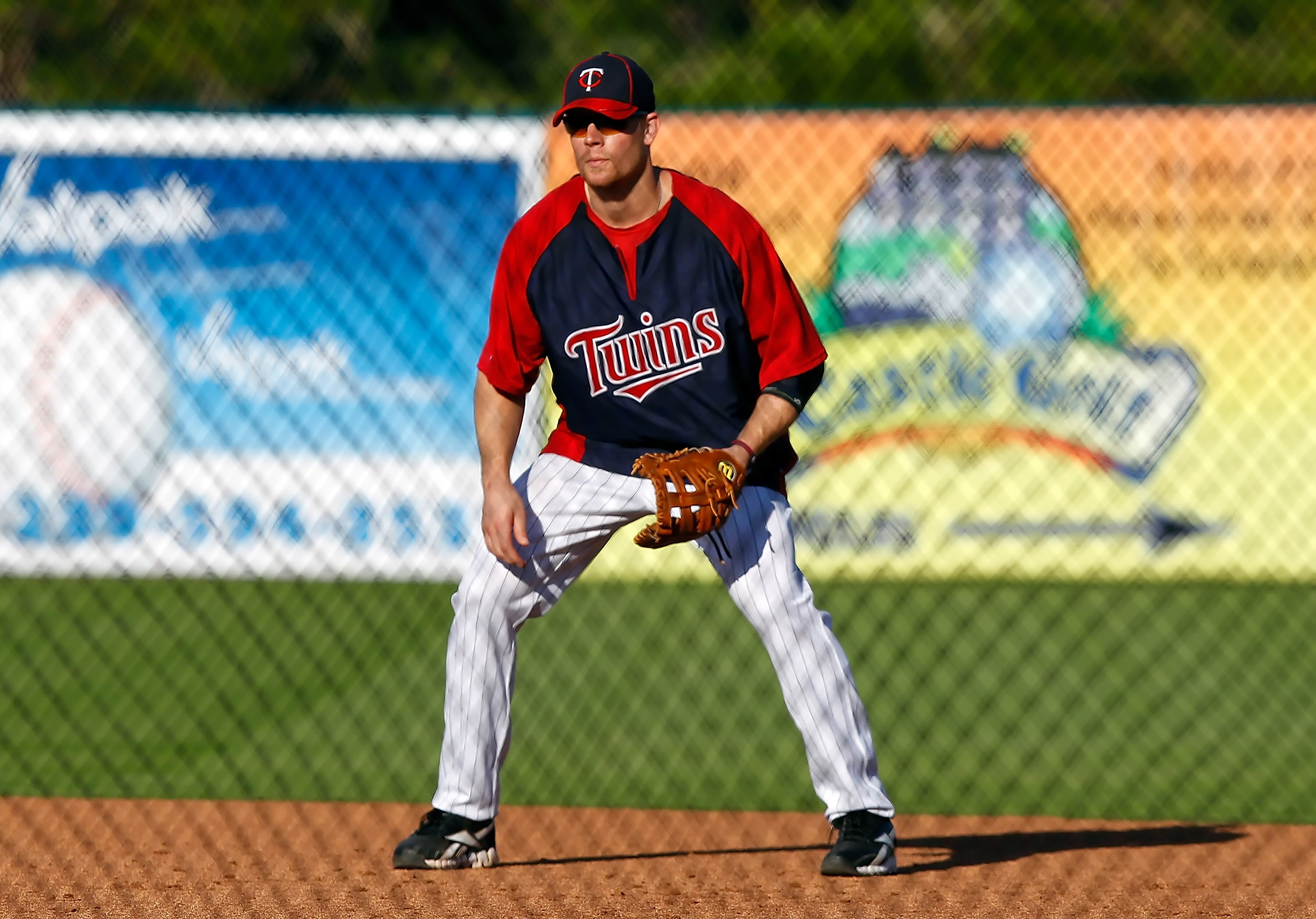 FORT MYERS, FL - FEBRUARY 27:  First baseman Justin Morneau #33 of the Minnesota Twins takes some ground balls just before the start of the Grapefruit League Spring Training Game against the Boston Red Sox at Hammond Stadium on February 27, 2011 in Fort M