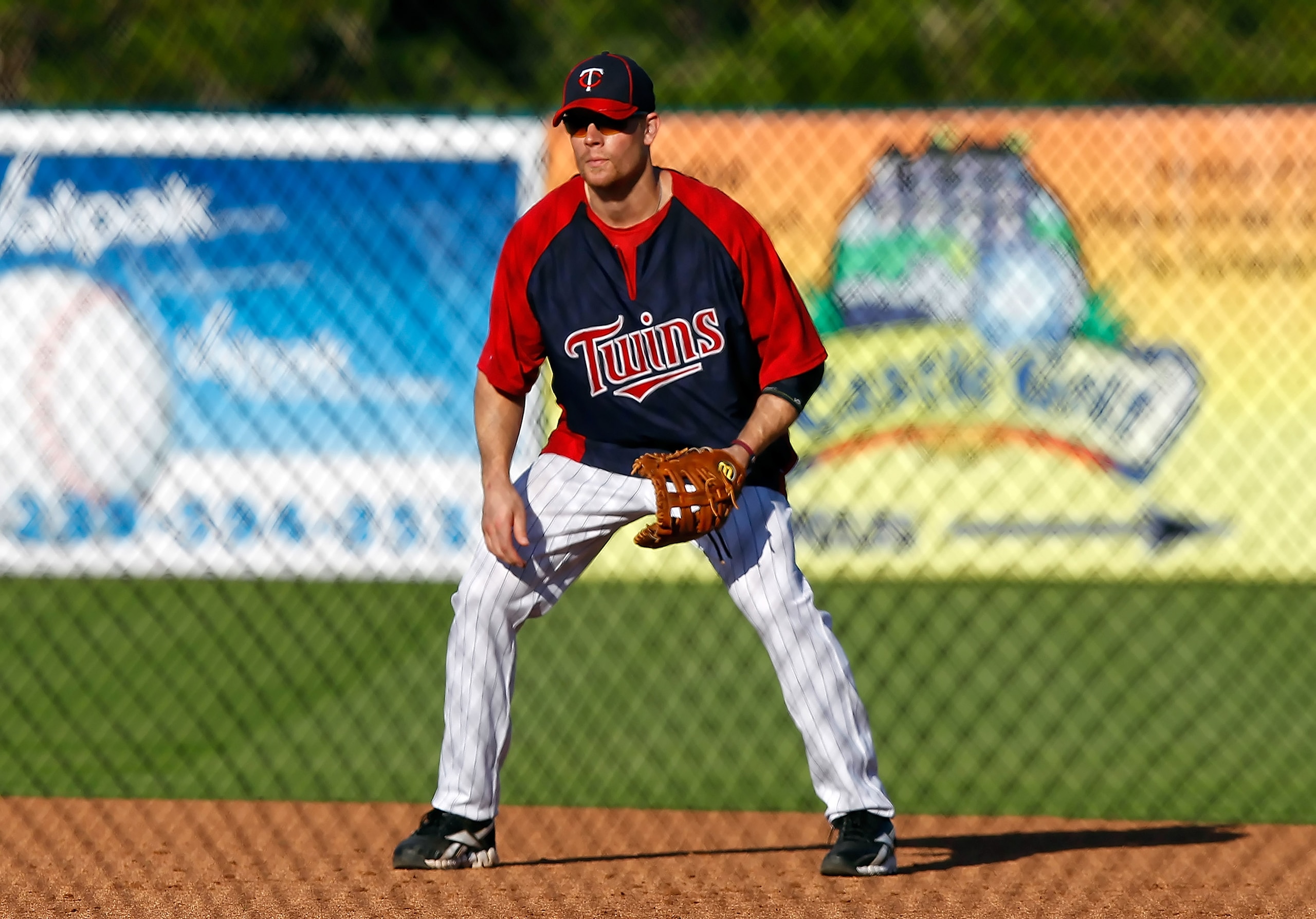 FORT MYERS, FL - FEBRUARY 27: First baseman Justin Morneau #33 of the Minnesota Twins takes some ground balls just before the start of the Grapefruit League Spring Training Game against the Boston Red Sox at Hammond Stadium on February 27, 2011 in Fort M FORT MYERS, FL - FEBRUARY 27: First baseman Justin Morneau #33 of the Minnesota Twins takes some ground balls just before the start of the Grapefruit League Spring Training Game against the Boston Red Sox at Hammond Stadium on February 27, 2011 in Fort M