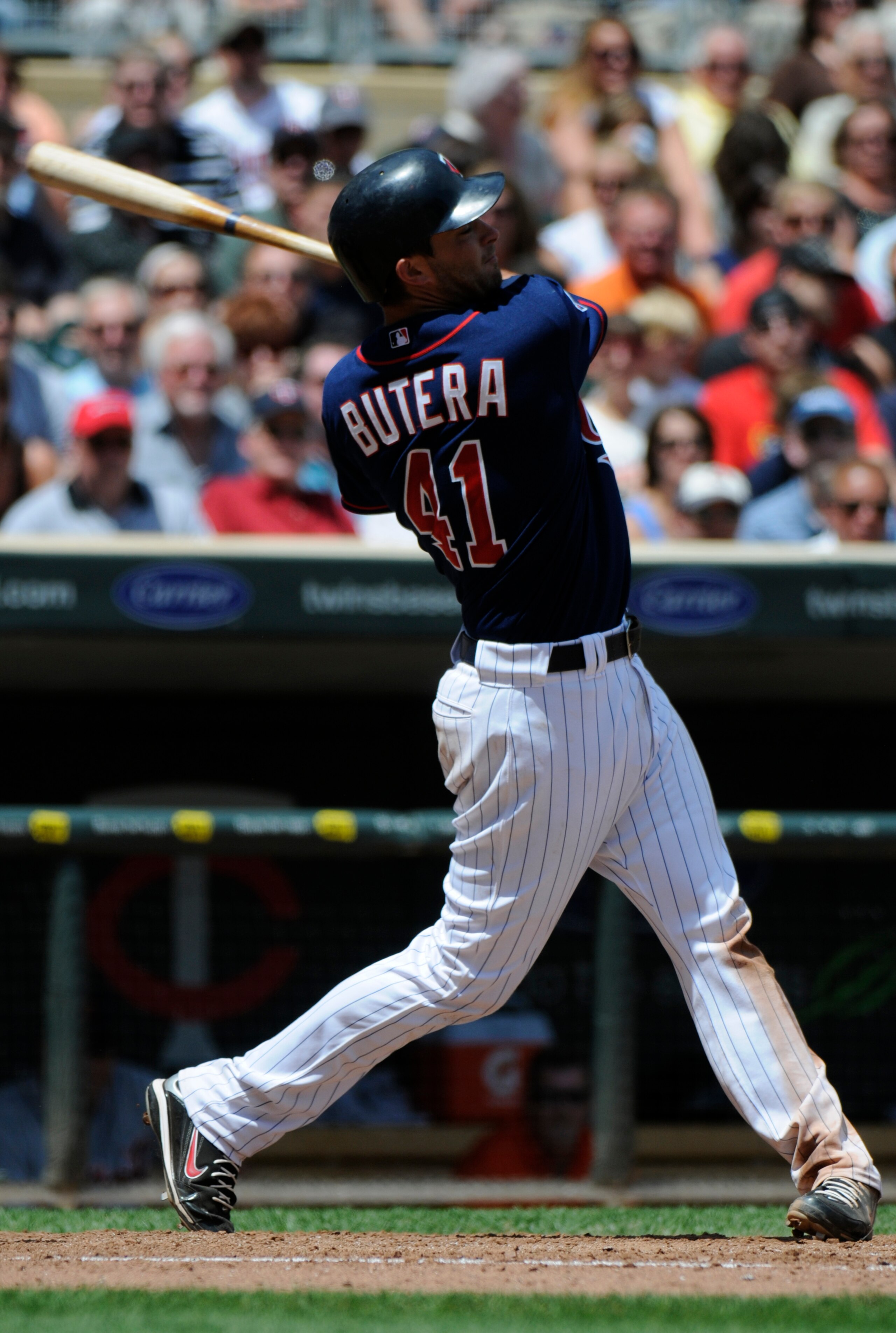 MINNEAPOLIS, MN - JUNE 30: Drew Butera #41 of the Minnesota Twins bats in the seventh inning against the Detroit Tigers during their game on June 30, 2010 at Target Field in Minneapolis, Minnesota. Twins won 5-1. (Photo by Hannah Foslien /Getty Images) MINNEAPOLIS, MN - JUNE 30: Drew Butera #41 of the Minnesota Twins bats in the seventh inning against the Detroit Tigers during their game on June 30, 2010 at Target Field in Minneapolis, Minnesota. Twins won 5-1. (Photo by Hannah Foslien /Getty Images)