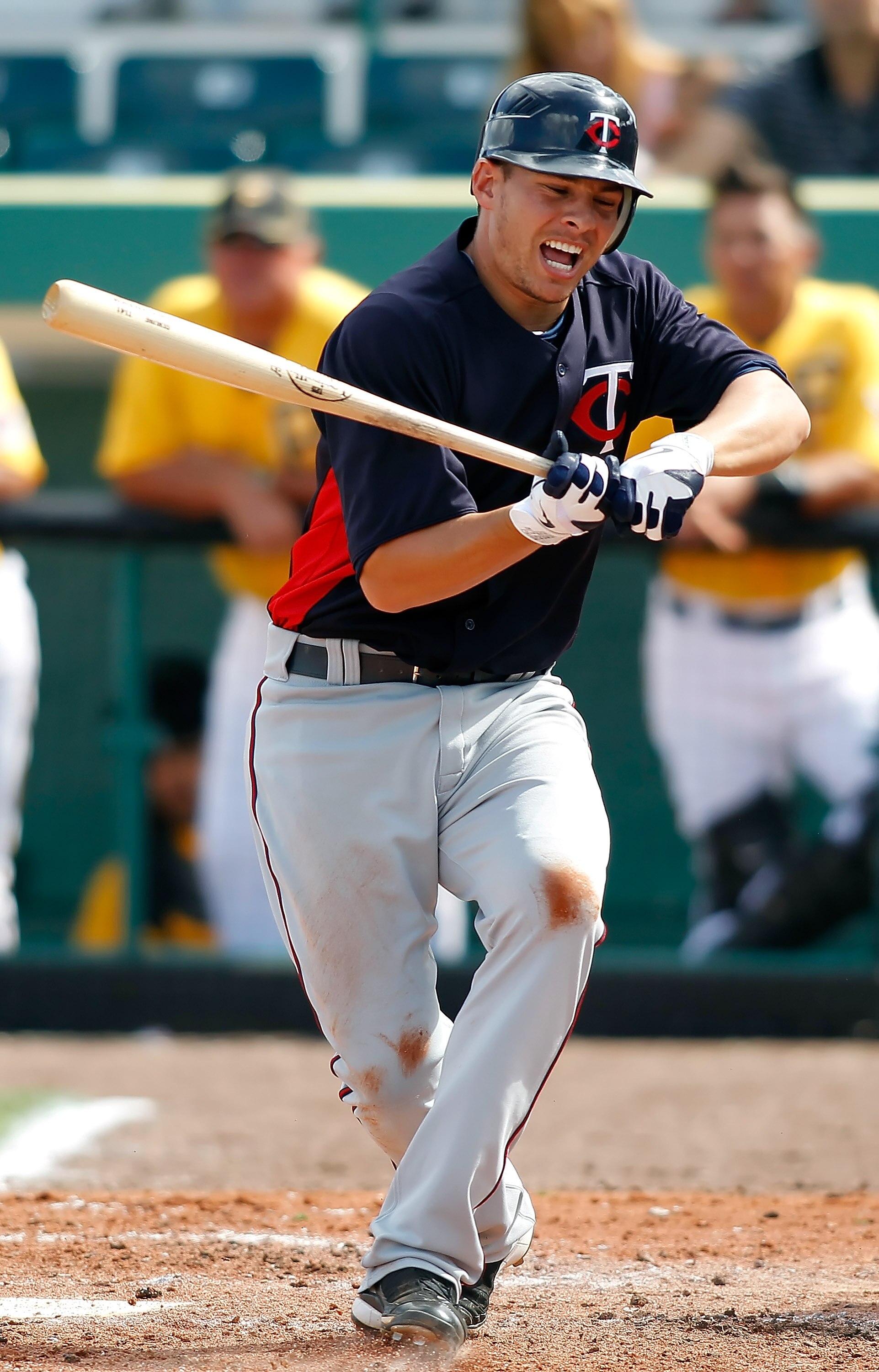 BRADENTON, FL - MARCH 02:  Infielder Luke Hughes #38 of the Minnesota Twins checks his swing against the Pittsburgh Pirates during a Grapefruit League Spring Training Game at McKechnie Field on March 2, 2011 in Bradenton, Florida.  (Photo by J. Meric/Gett