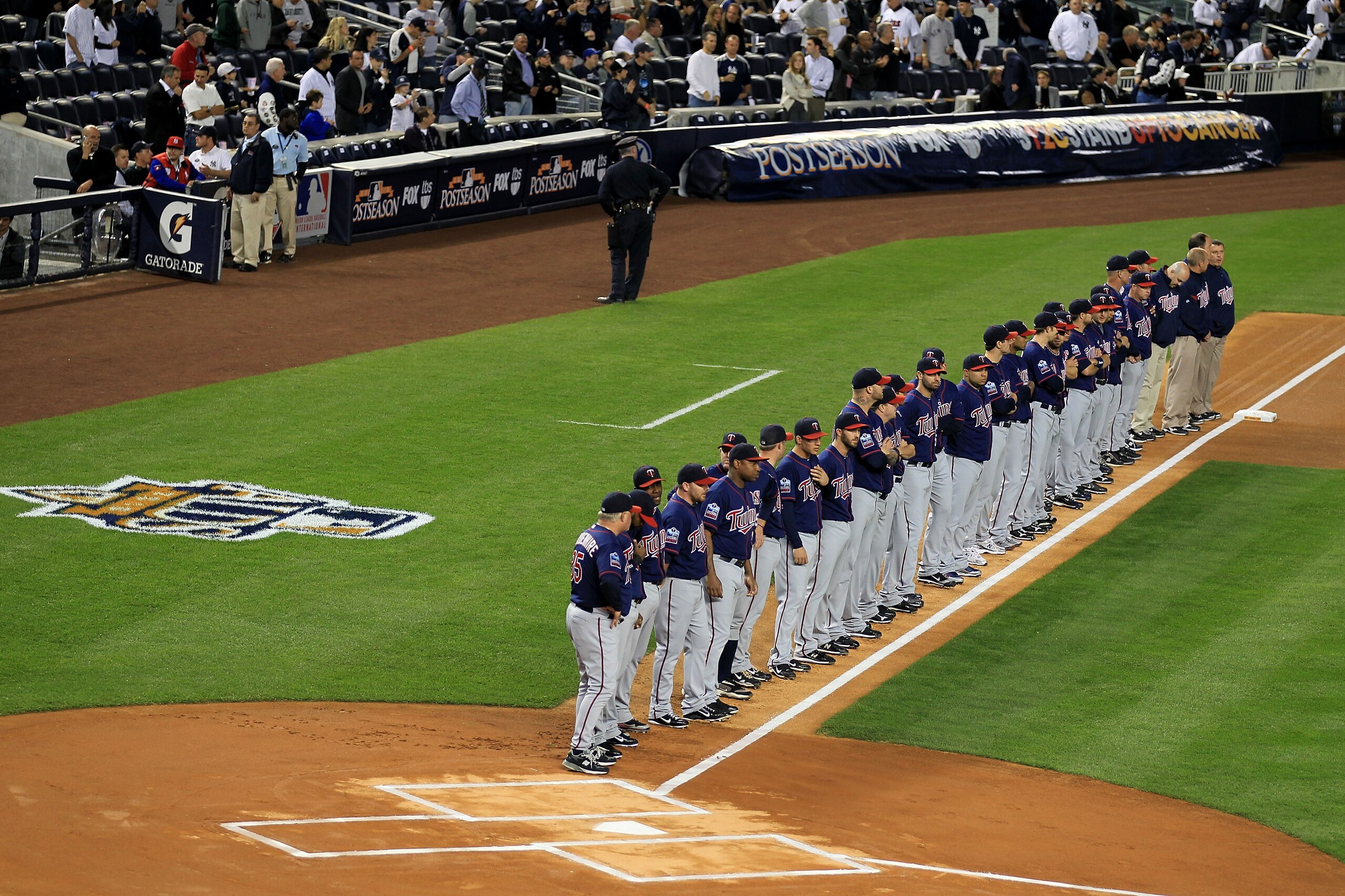 NEW YORK - OCTOBER 09: The Minnesota Twins line up on the foul line during player introductions against the New York Yankees during Game Three of the ALDS part of the 2010 MLB Playoffs at Yankee Stadium on October 9, 2010 in the Bronx borough of New Yor NEW YORK - OCTOBER 09: The Minnesota Twins line up on the foul line during player introductions against the New York Yankees during Game Three of the ALDS part of the 2010 MLB Playoffs at Yankee Stadium on October 9, 2010 in the Bronx borough of New Yor