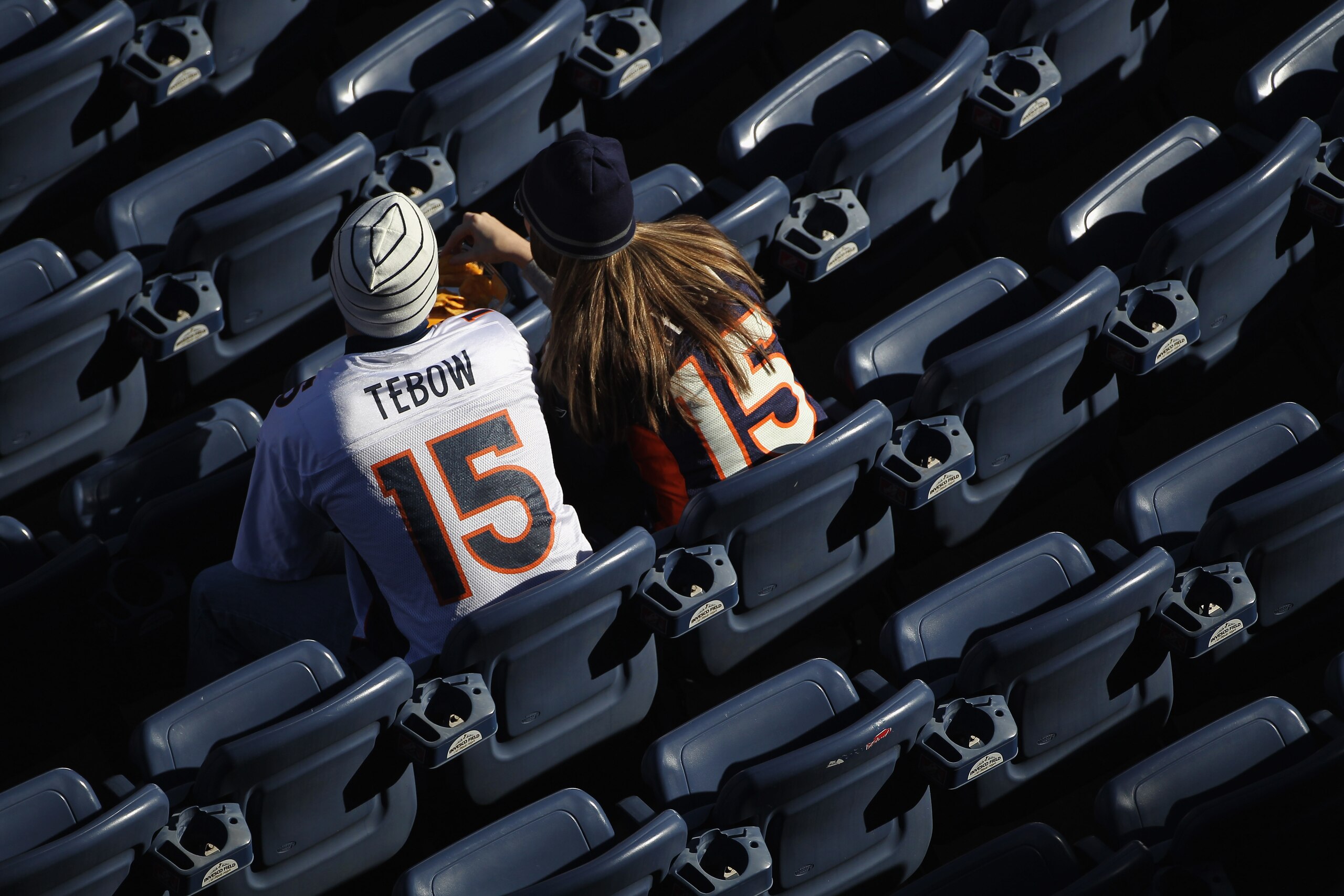 DENVER - DECEMBER 26:  Fans wearing Tim Tebow jersies begin to occupy the empty seats prior to the game as the Denver Broncos host the Houston Texas at INVESCO Field at Mile High on December 26, 2010 in Denver, Colorado. The Broncos defeated the Texans 24