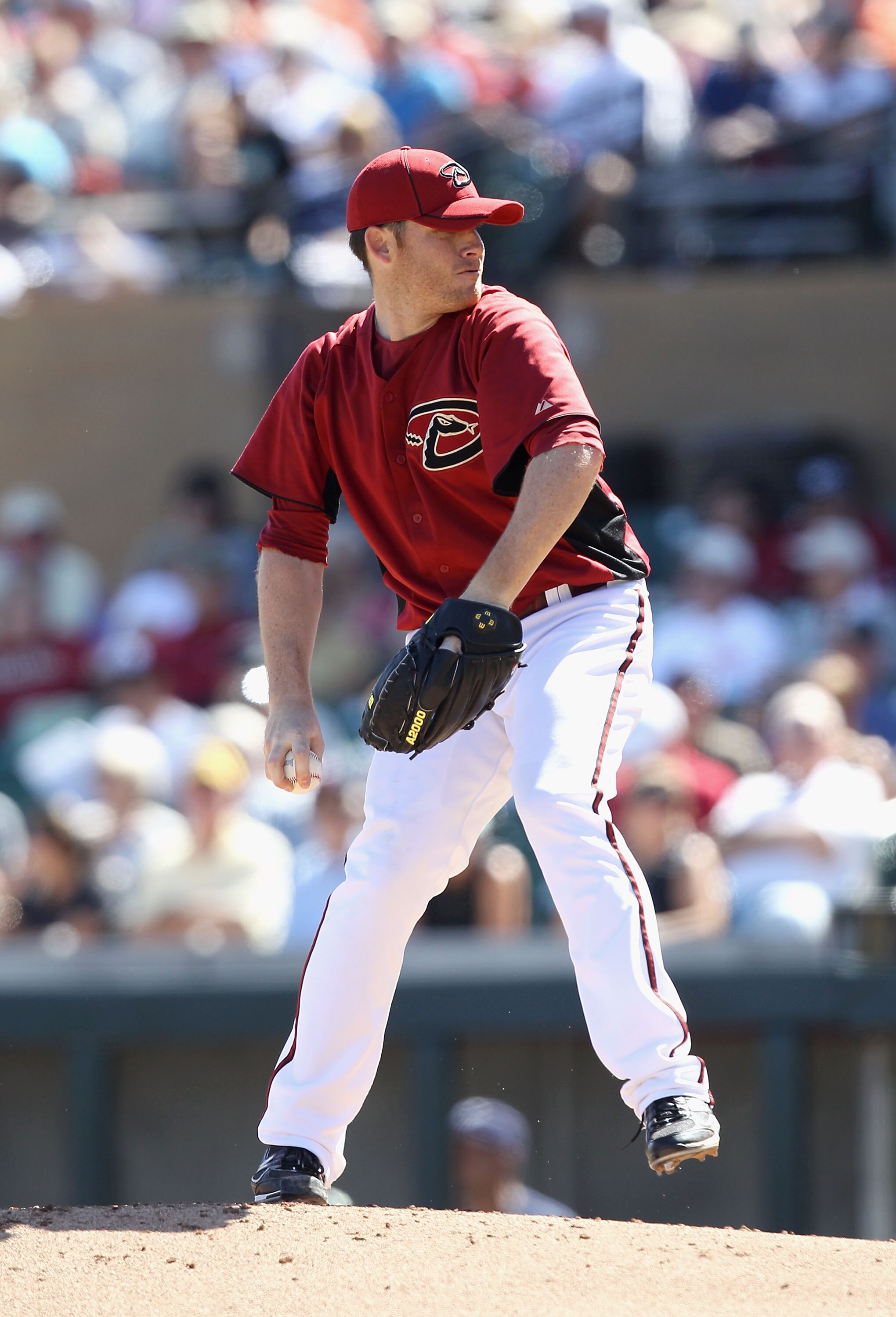 SCOTTSDALE, AZ - MARCH 09:  Starting pitcher Ian Kennedy #31 of the Arizona Diamondbacks pitches against the Milwaukee Brewers during the spring training game at Salt River Fields at Talking Stick on March 9, 2011 in Scottsdale, Arizona.  (Photo by Christ