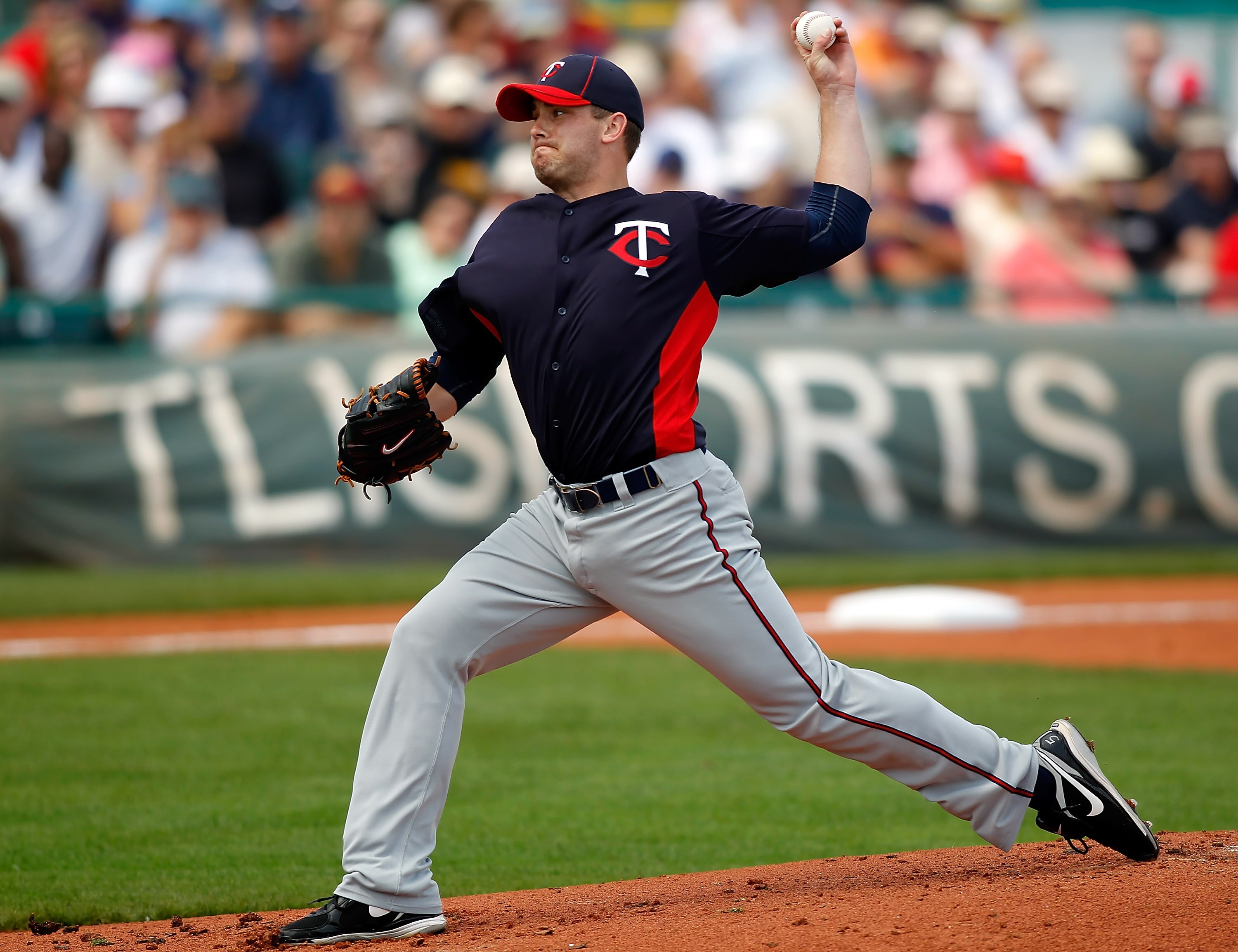 BRADENTON, FL - MARCH 02:  Pitcher Brian Duensing #52 of the Minnesota Twins pitches against the Pittsburgh Pirates during a Grapefruit League Spring Training Game at McKechnie Field on March 2, 2011 in Bradenton, Florida.  (Photo by J. Meric/Getty Images