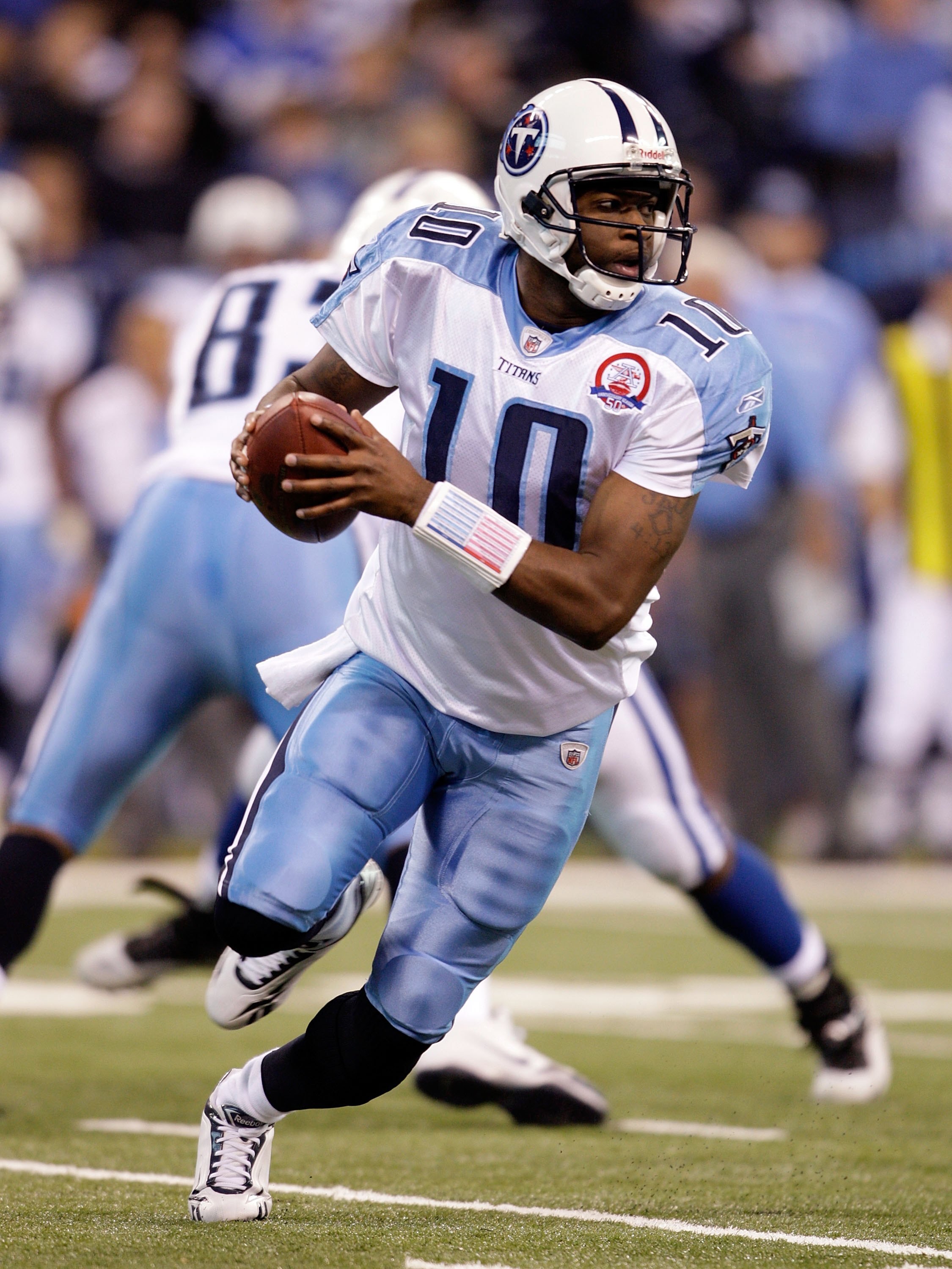 INDIANAPOLIS - DECEMBER 06:  Vince Young #10 of  the Tennessee Titans runs with the ball during the NFL game against the Indianapolis Colts at Lucas Oil Stadium on December 6, 2009 in Indianapolis, Indiana.  (Photo by Andy Lyons/Getty Images)